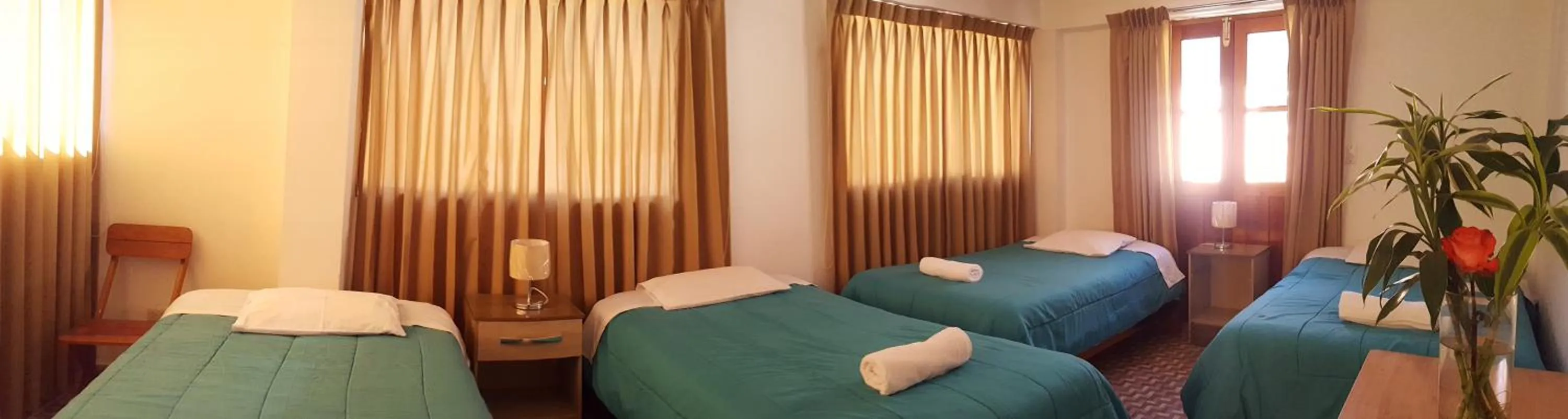 Bed in Tambo de Ollantay Hotel