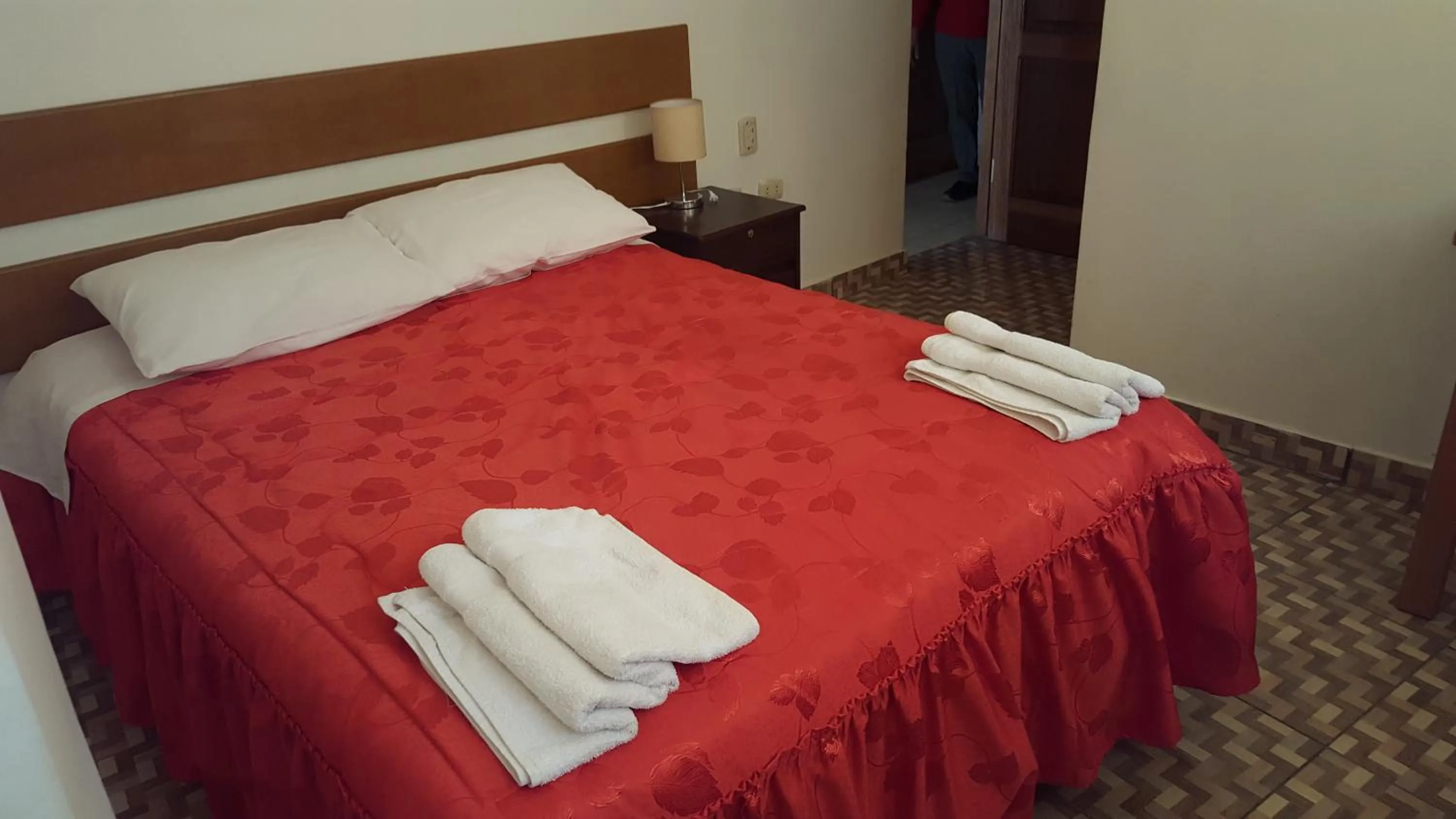 Bed in Tambo de Ollantay Hotel