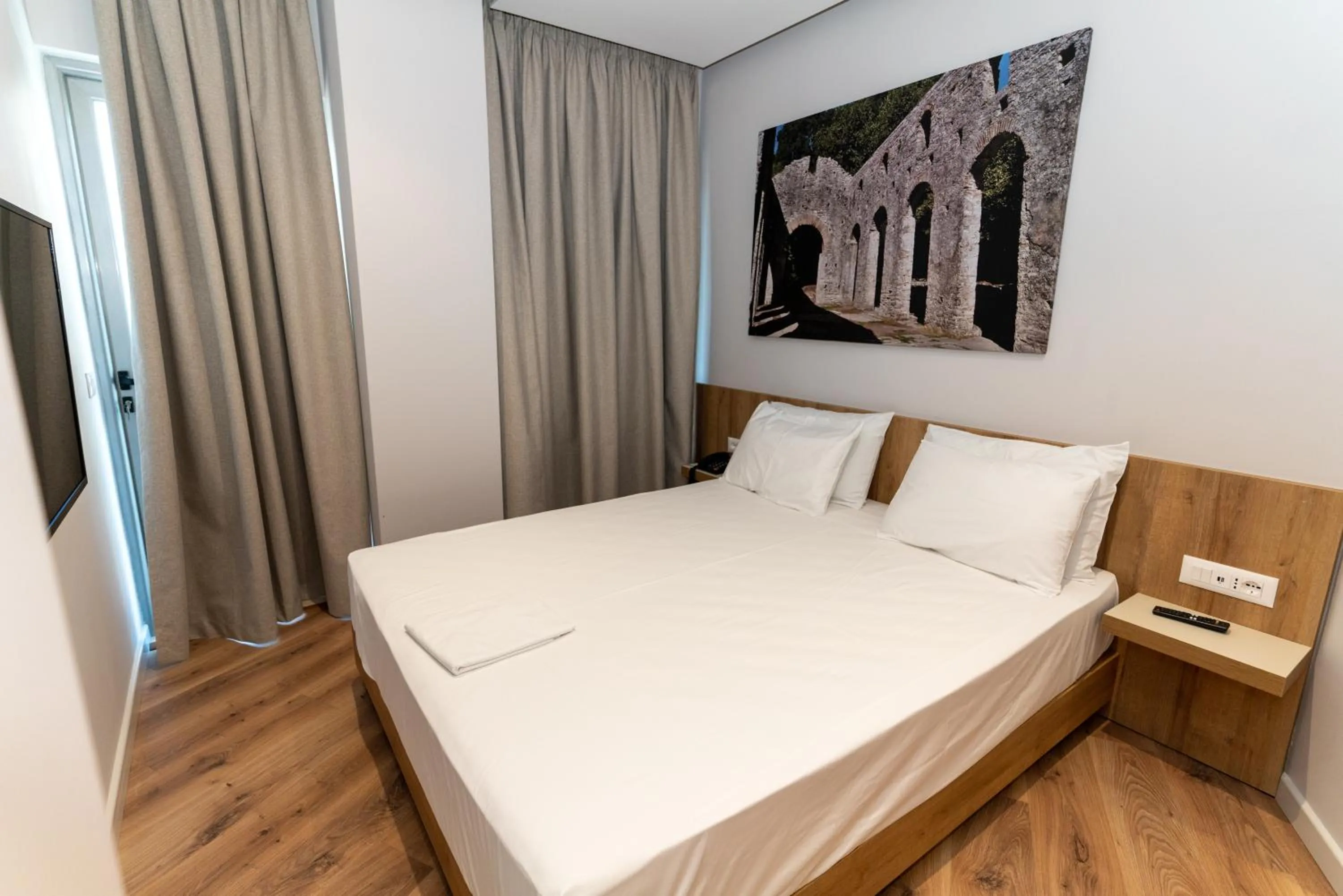 Bed in Titania Hotel