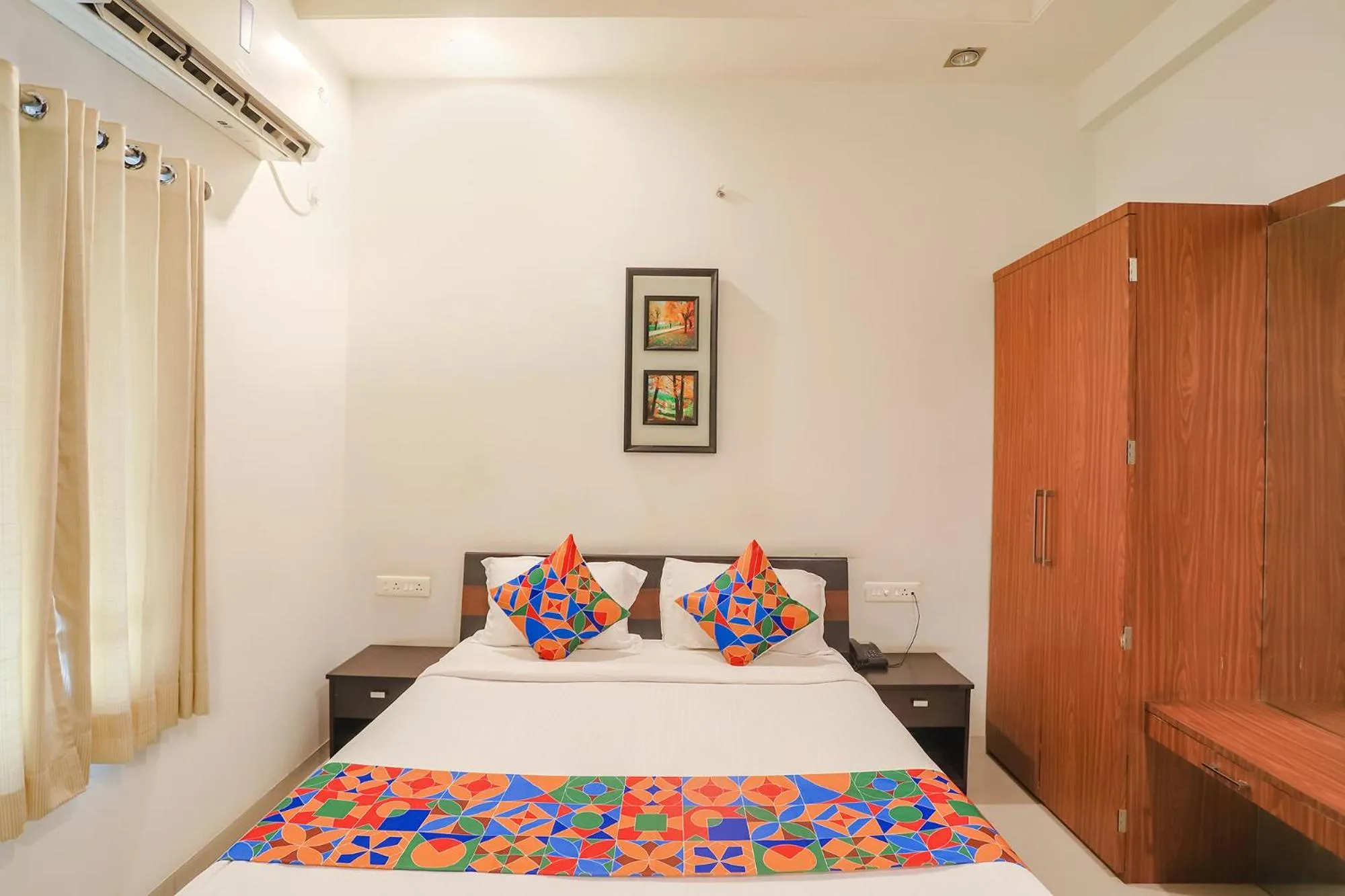 Bed in FabHotel Archanil Apartment - Sitanagar Cricket Ground
