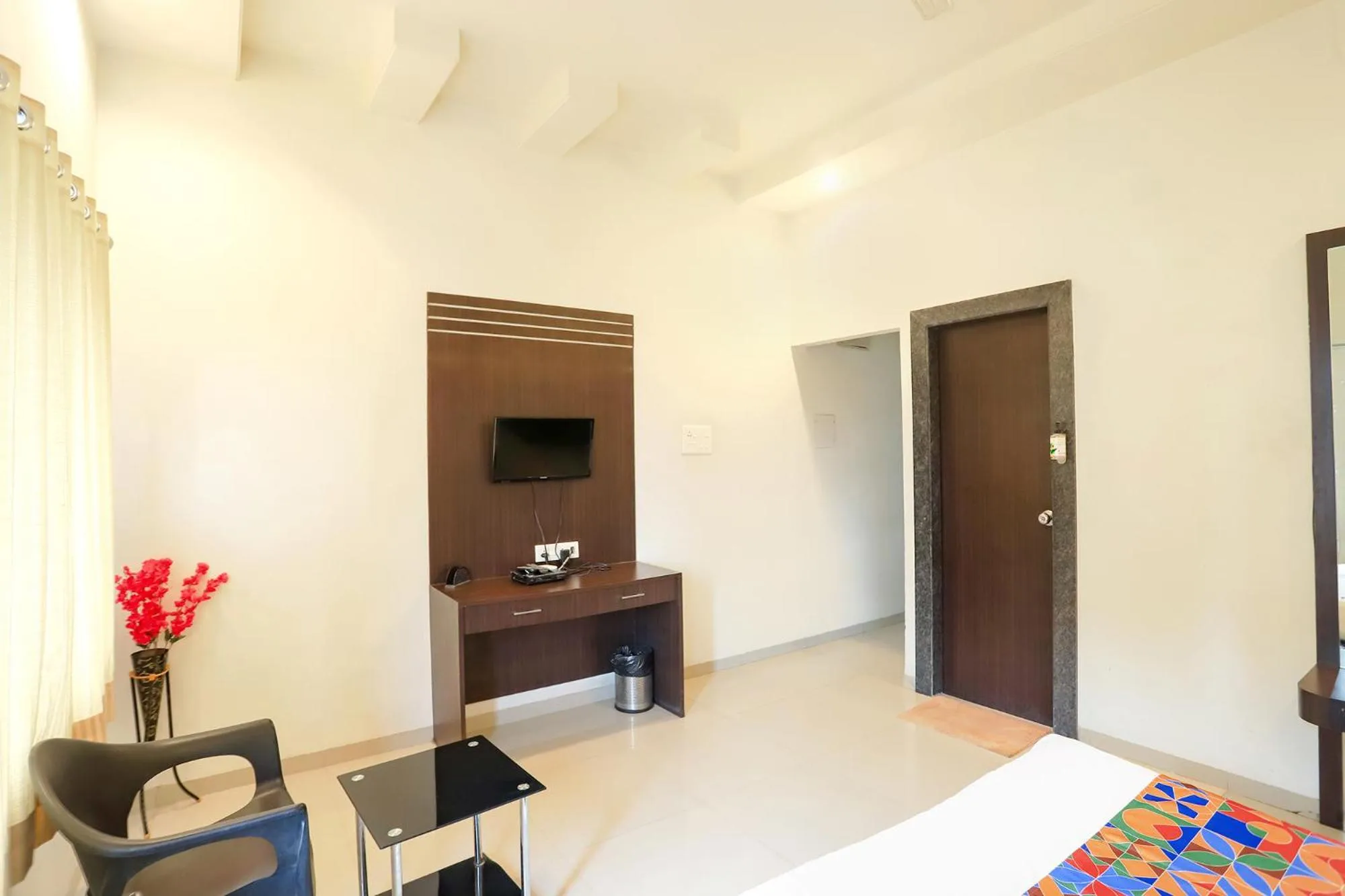 Bed in FabHotel Archanil Apartment - Sitanagar Cricket Ground