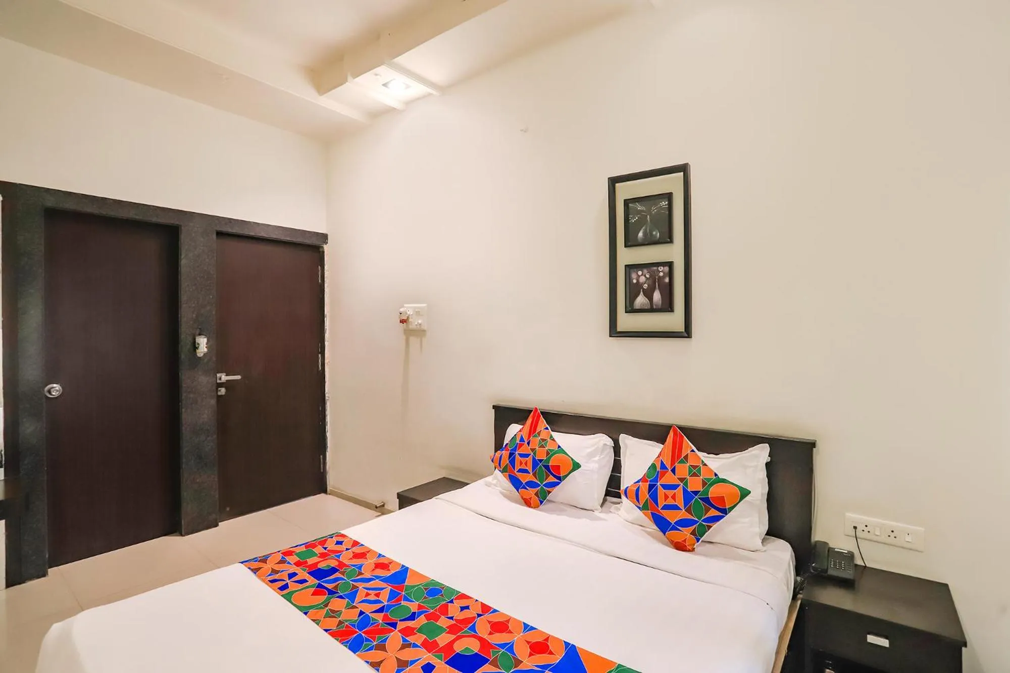 Bed in FabHotel Archanil Apartment - Sitanagar Cricket Ground