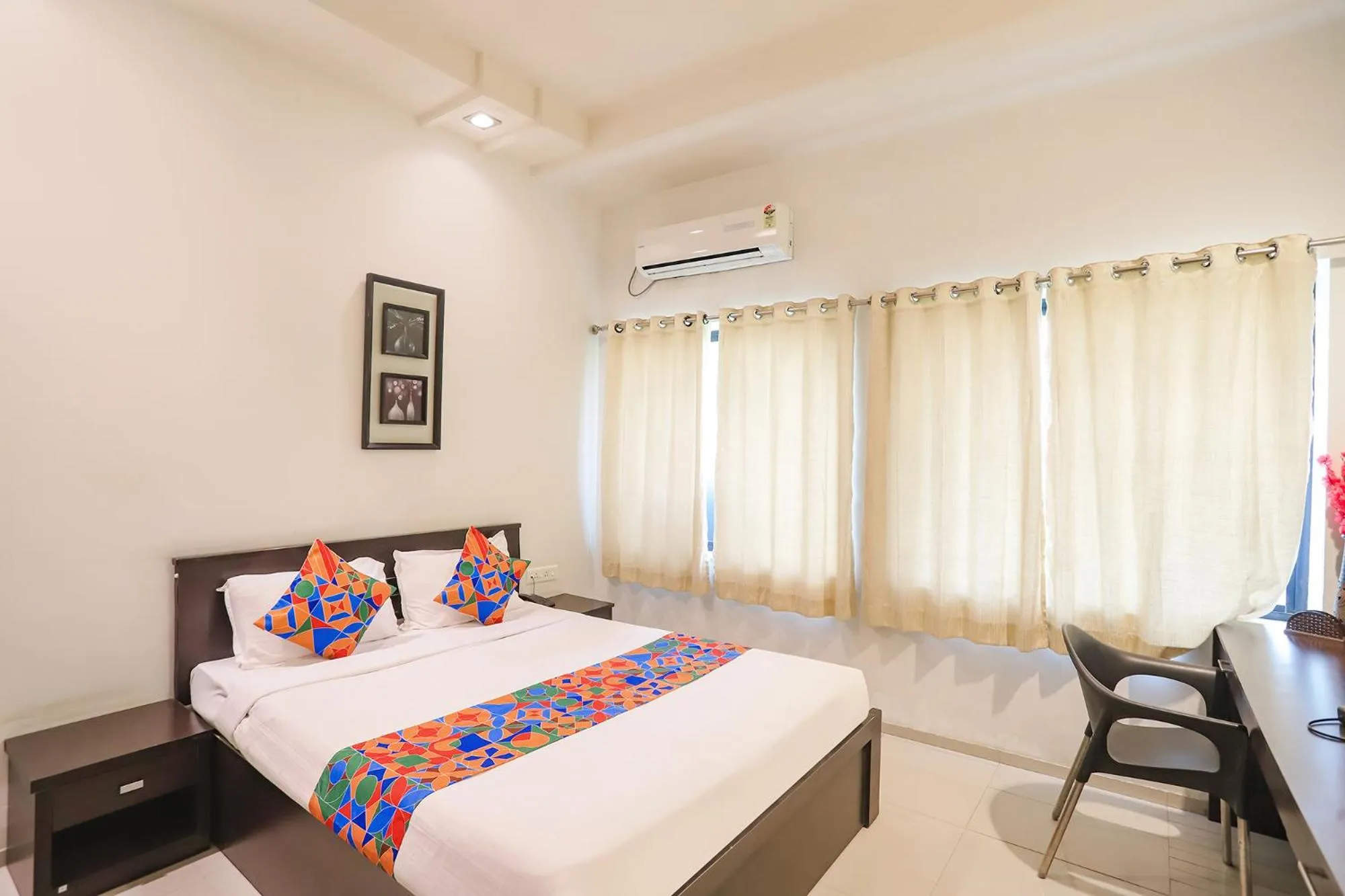 Bed in FabHotel Archanil Apartment - Sitanagar Cricket Ground