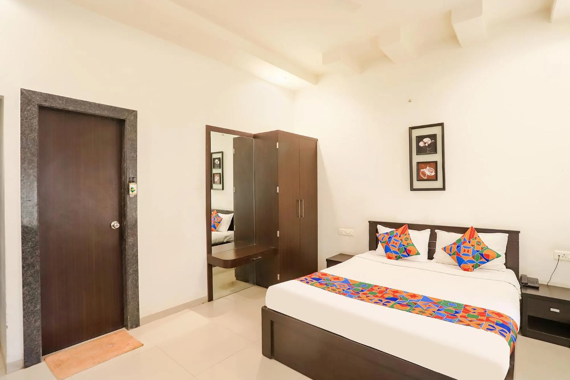 Bed in FabHotel Archanil Apartment - Sitanagar Cricket Ground