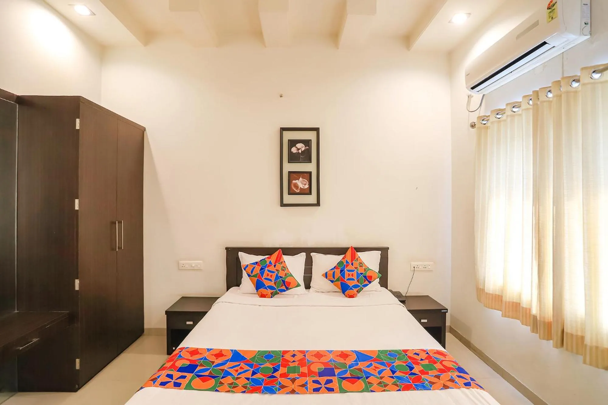 Bed in FabHotel Archanil Apartment - Sitanagar Cricket Ground