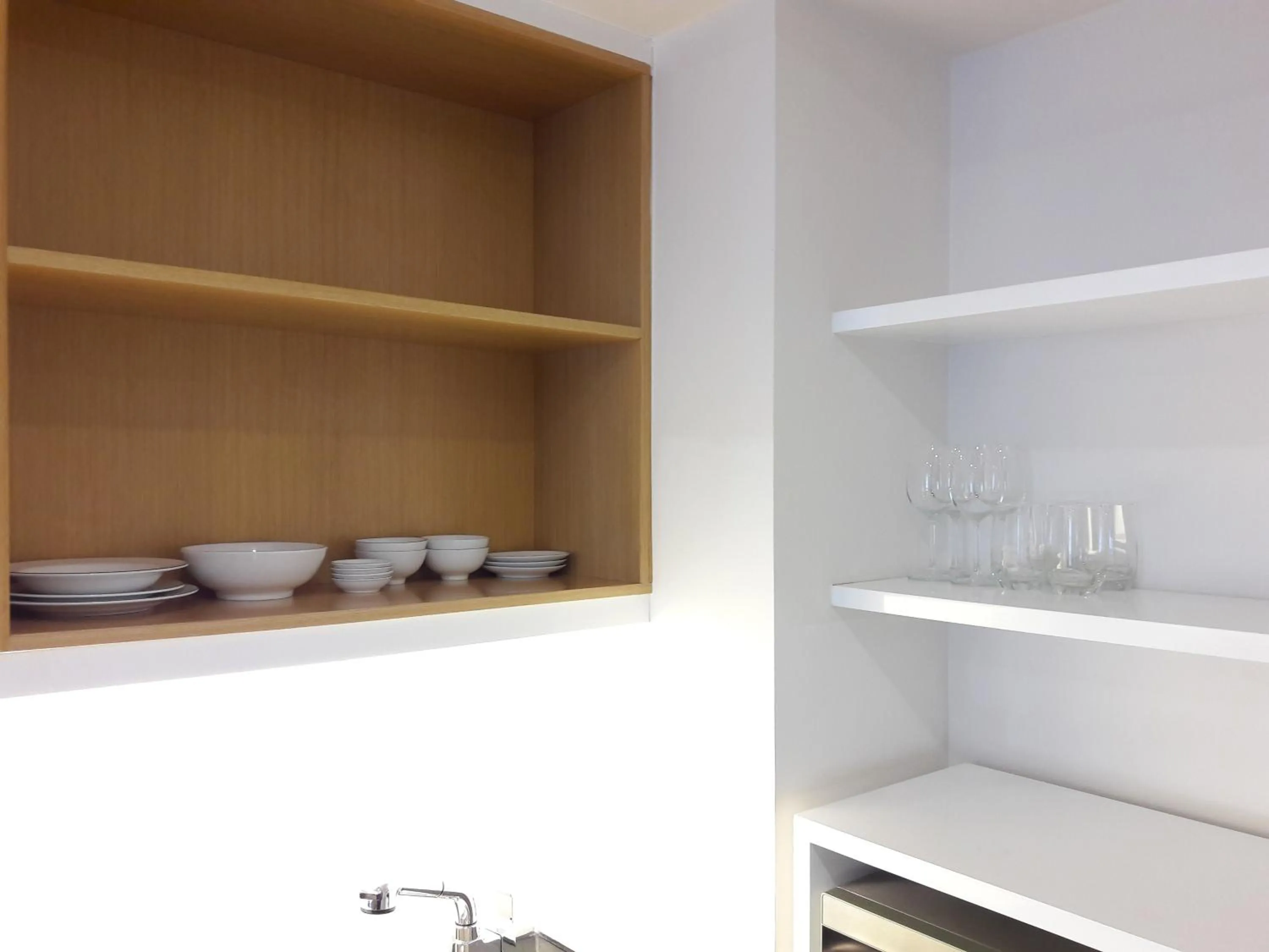 Kitchen or kitchenette in Bluesky Serviced Apartment Airport Plaza