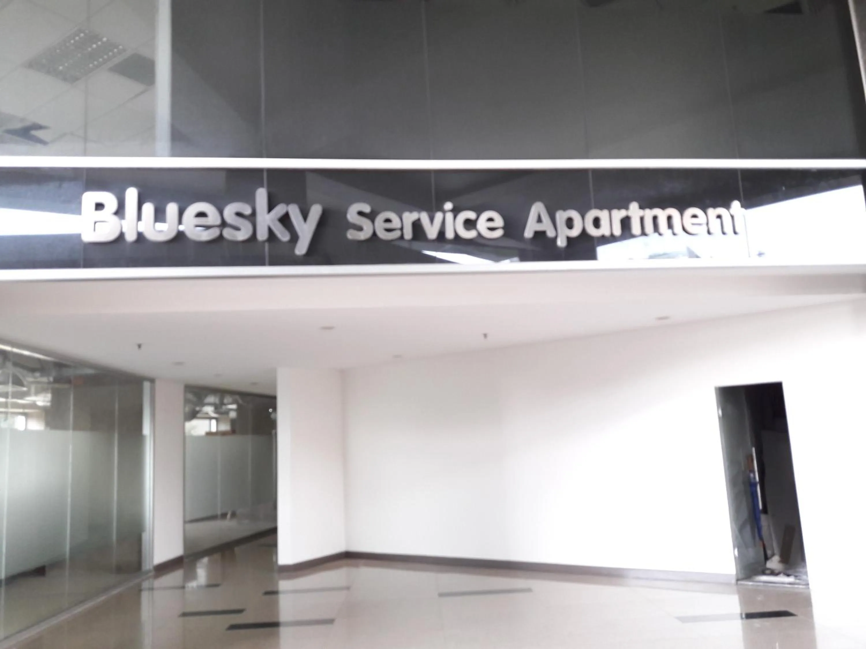 Property logo or sign in Bluesky Serviced Apartment Airport Plaza