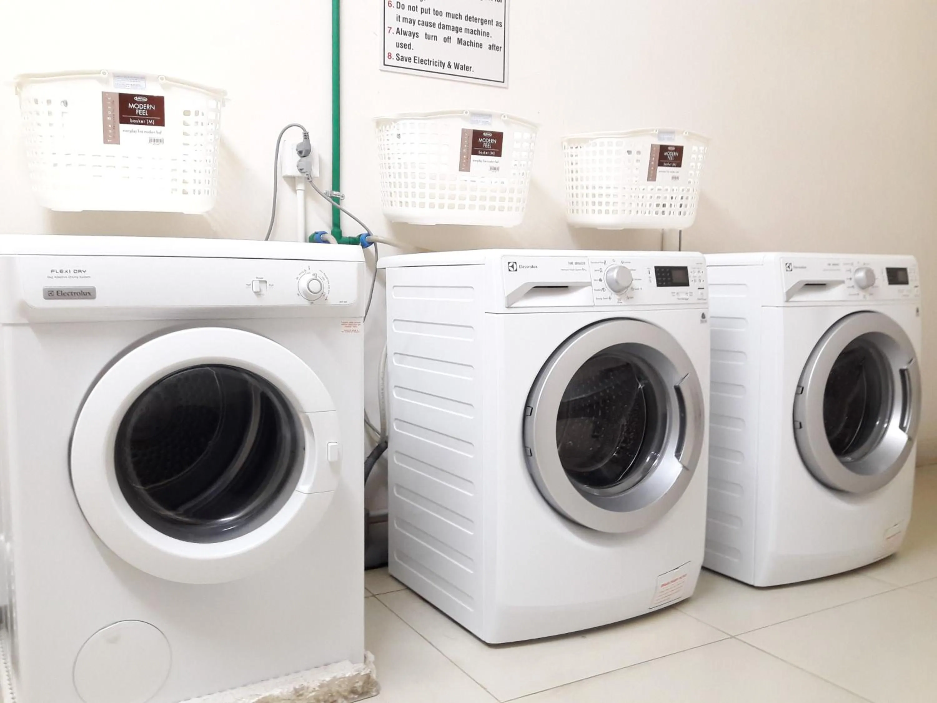 Communal kitchen in Bluesky Serviced Apartment Airport Plaza