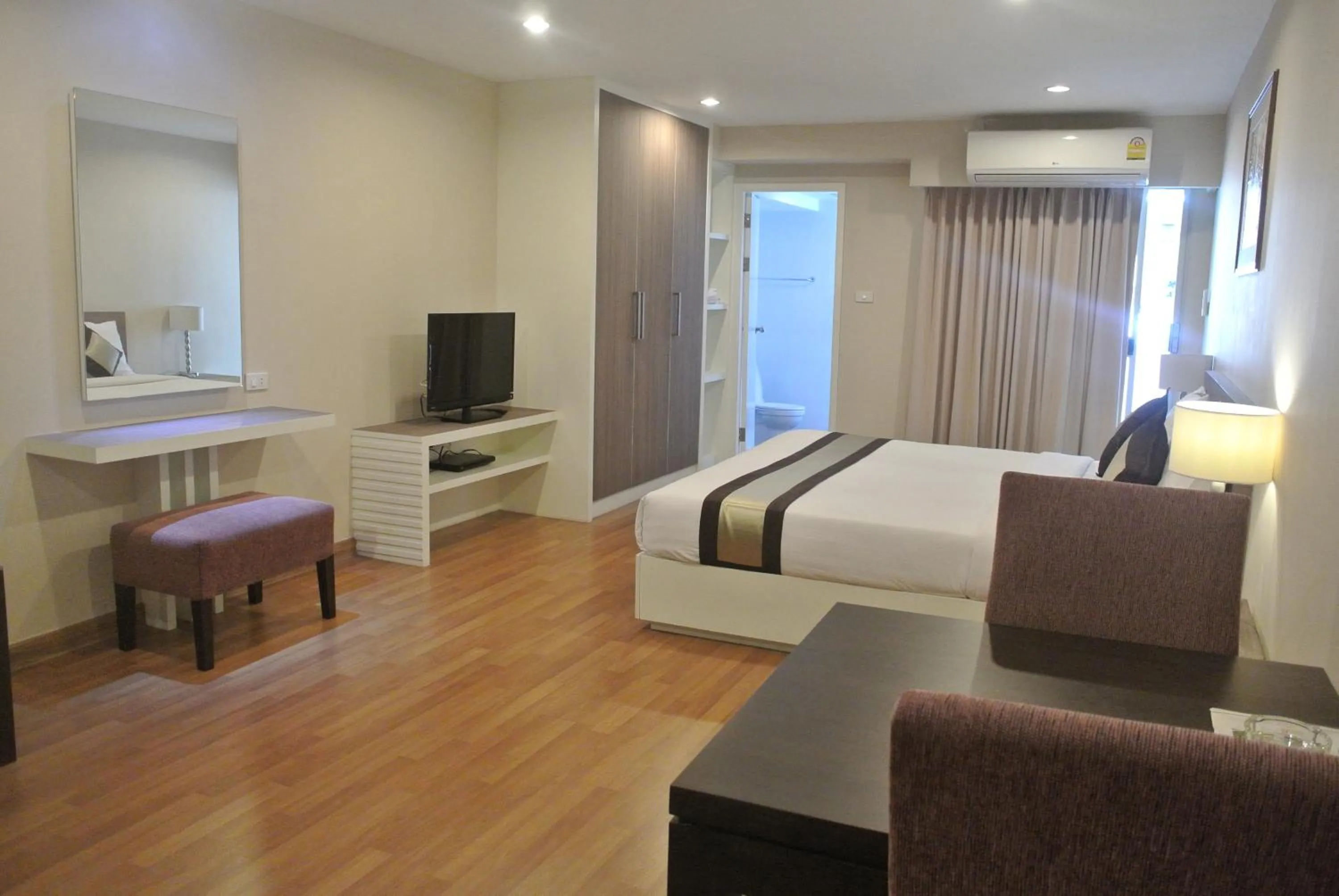 Photo of the whole room, Bed in Nanatai Suites