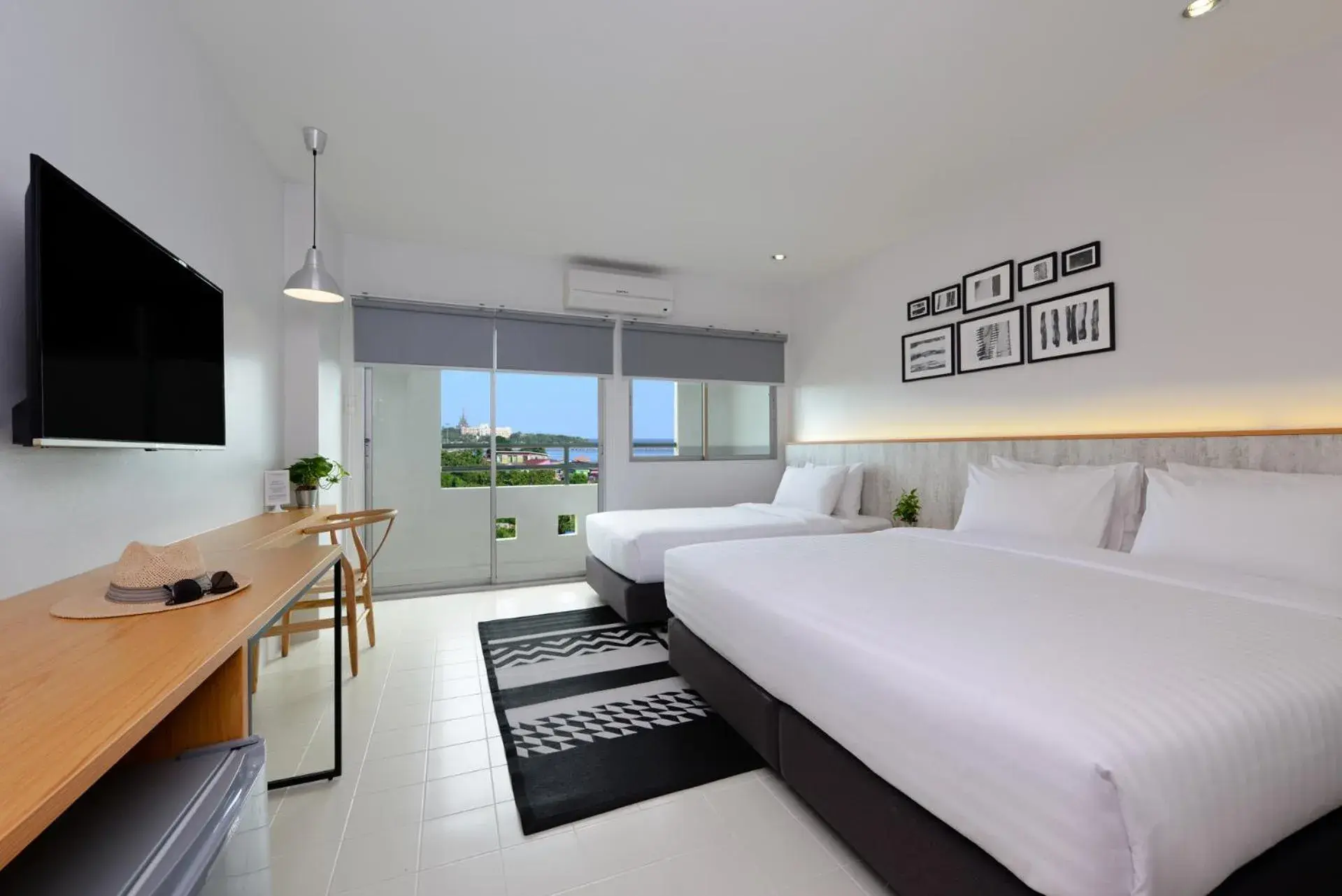 Deluxe Triple Room with Sea View in Ruenthip Pattaya Deluxe Triple Room with Sea View in Ruenthip Pattaya
