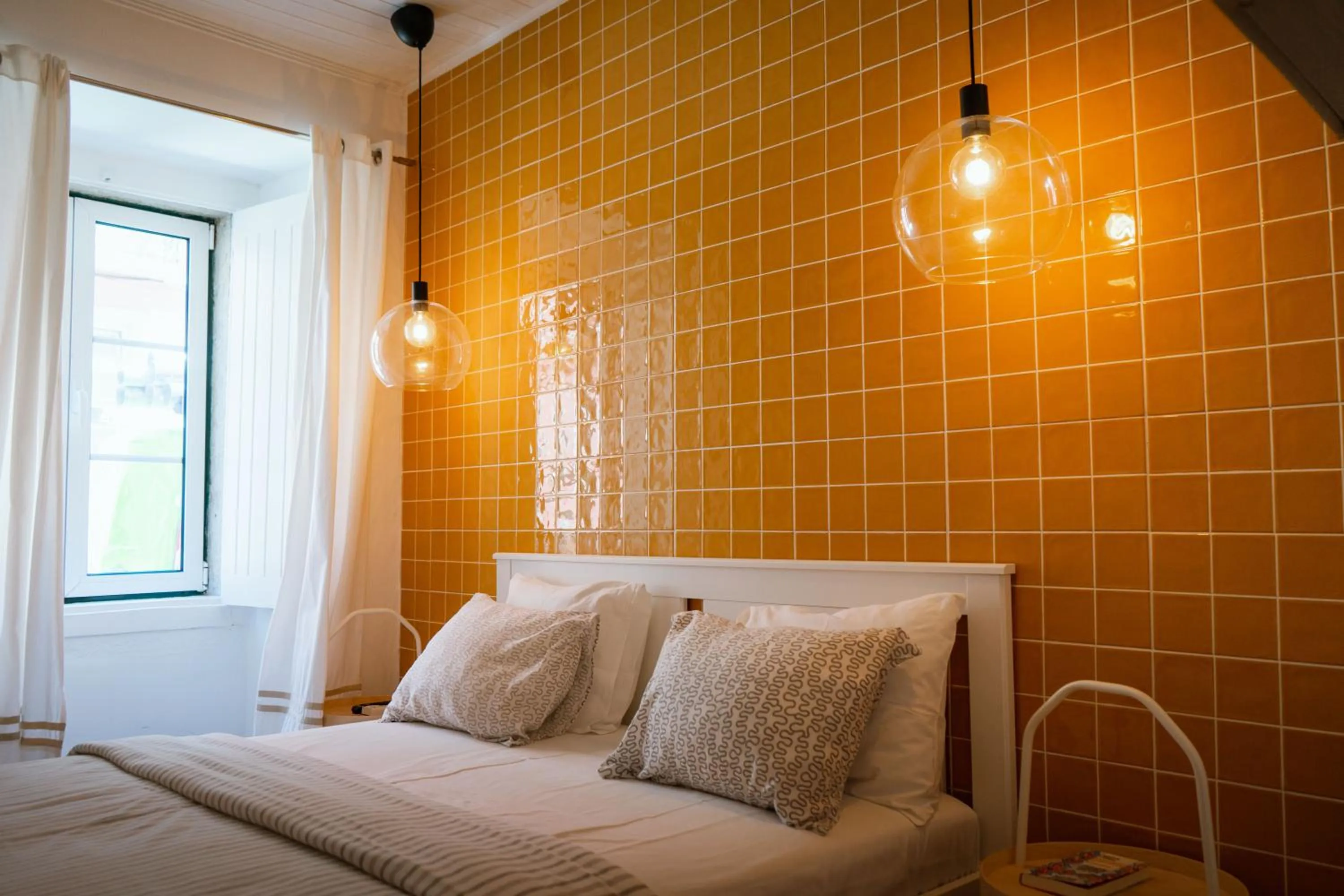 Bed in Flores Guest House