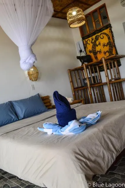 Bed in Blue Lagoon Dive Resort