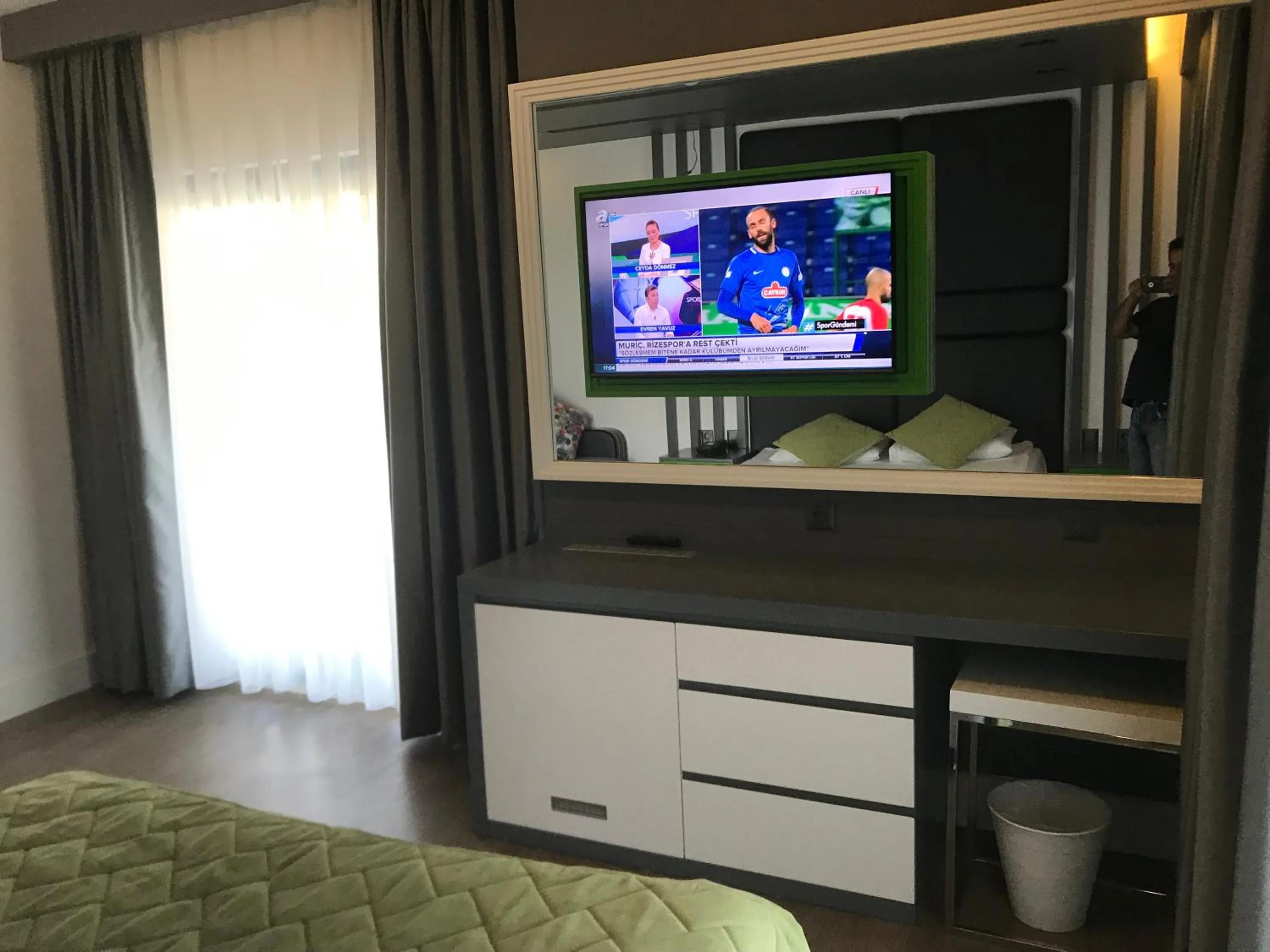 Communal lounge/ TV room, Bed in Oyster Boutique Hotel