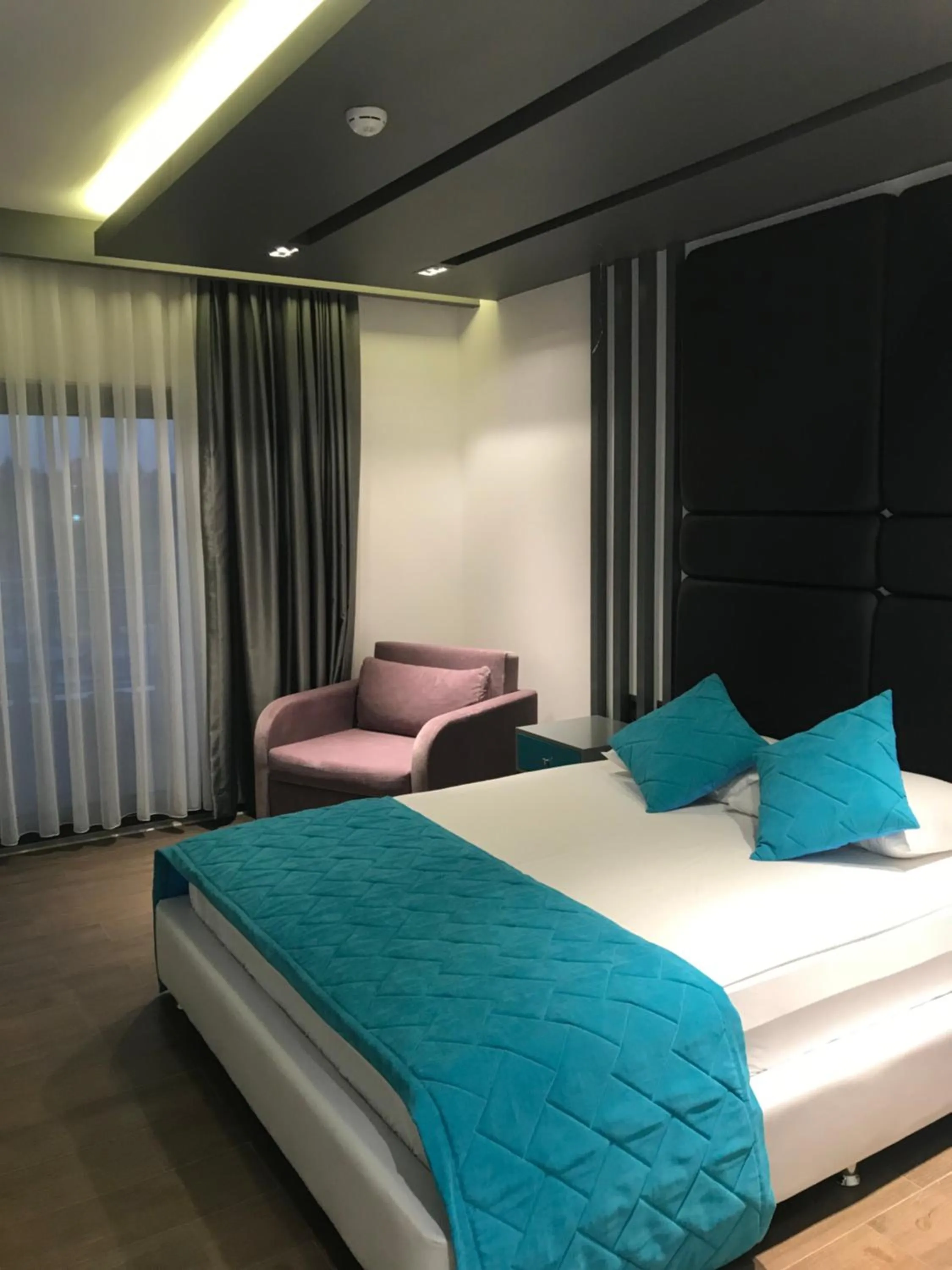 Bed in Oyster Boutique Hotel