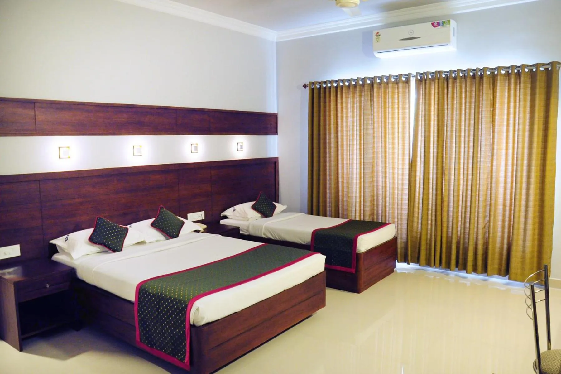 Bedroom, Bed in Bhasuri Inn Guruvayoor