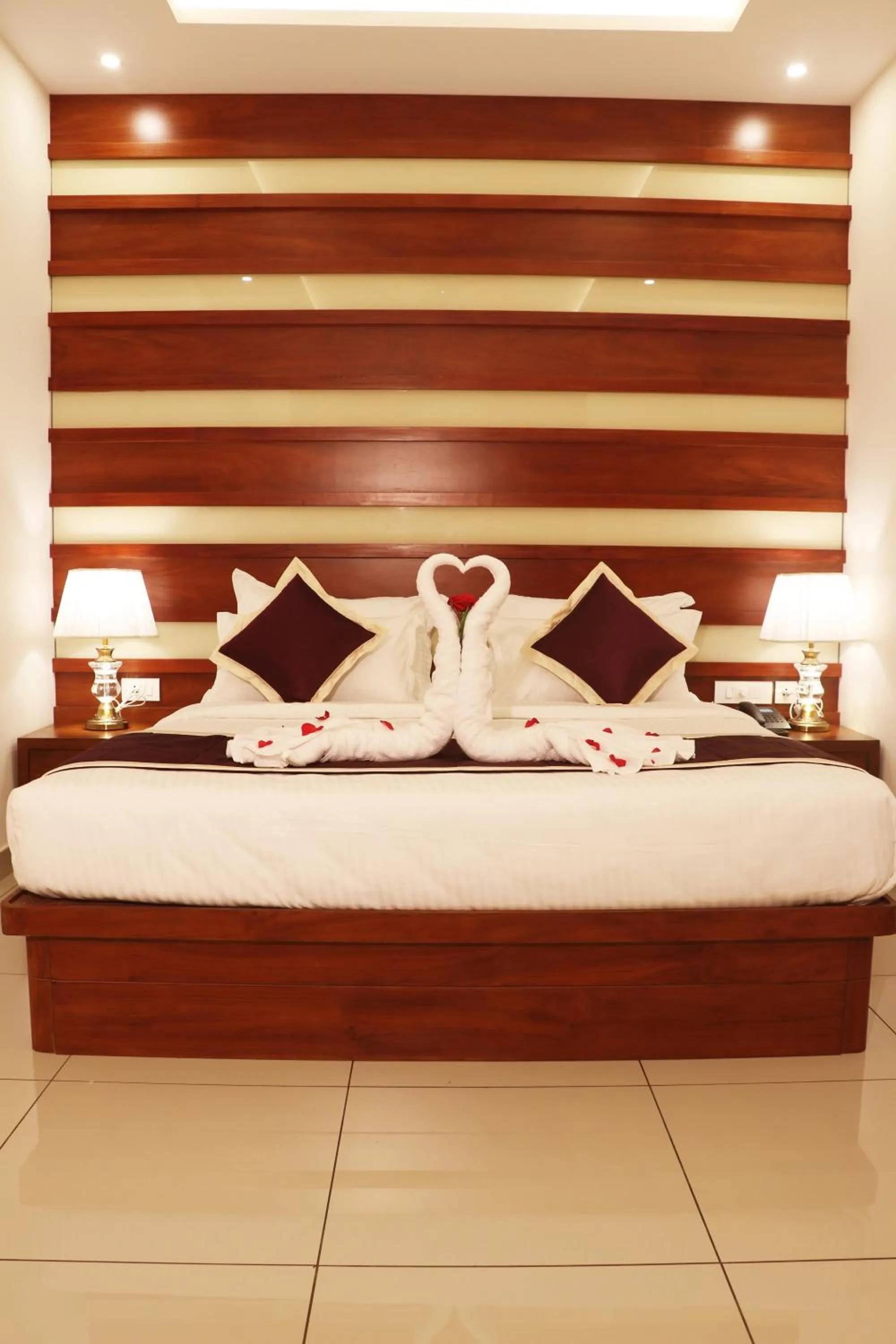 Bed in Bhasuri Inn Guruvayoor