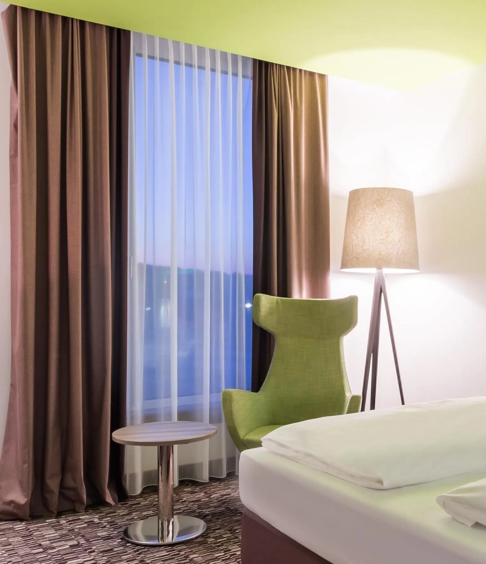 Seating area, Bed in Park Inn by Radisson Neumarkt