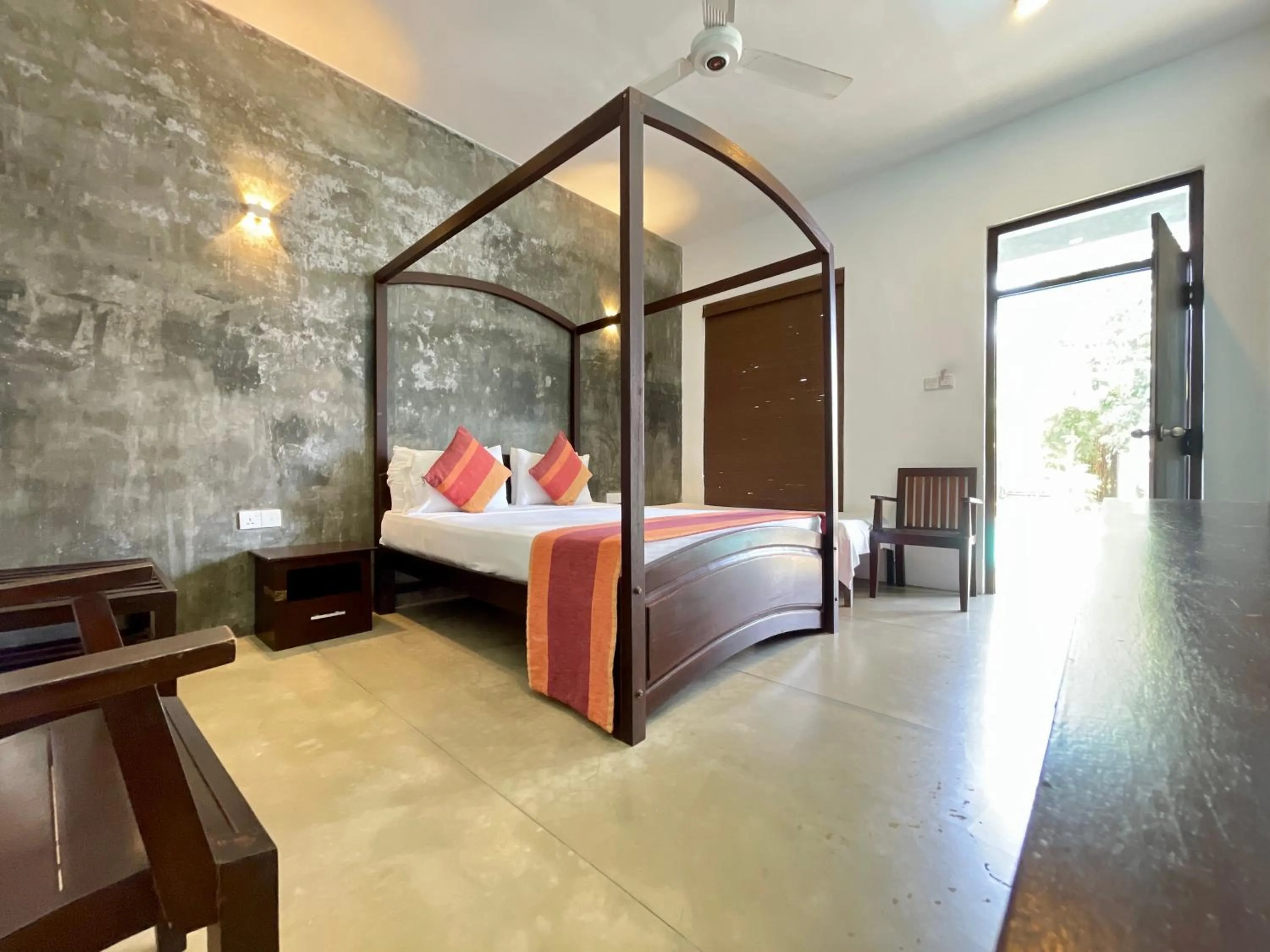 Bed in Olanro Hotel Negombo