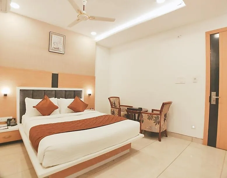 Photo of the whole room, Bed in TGI Insignia Bhopal