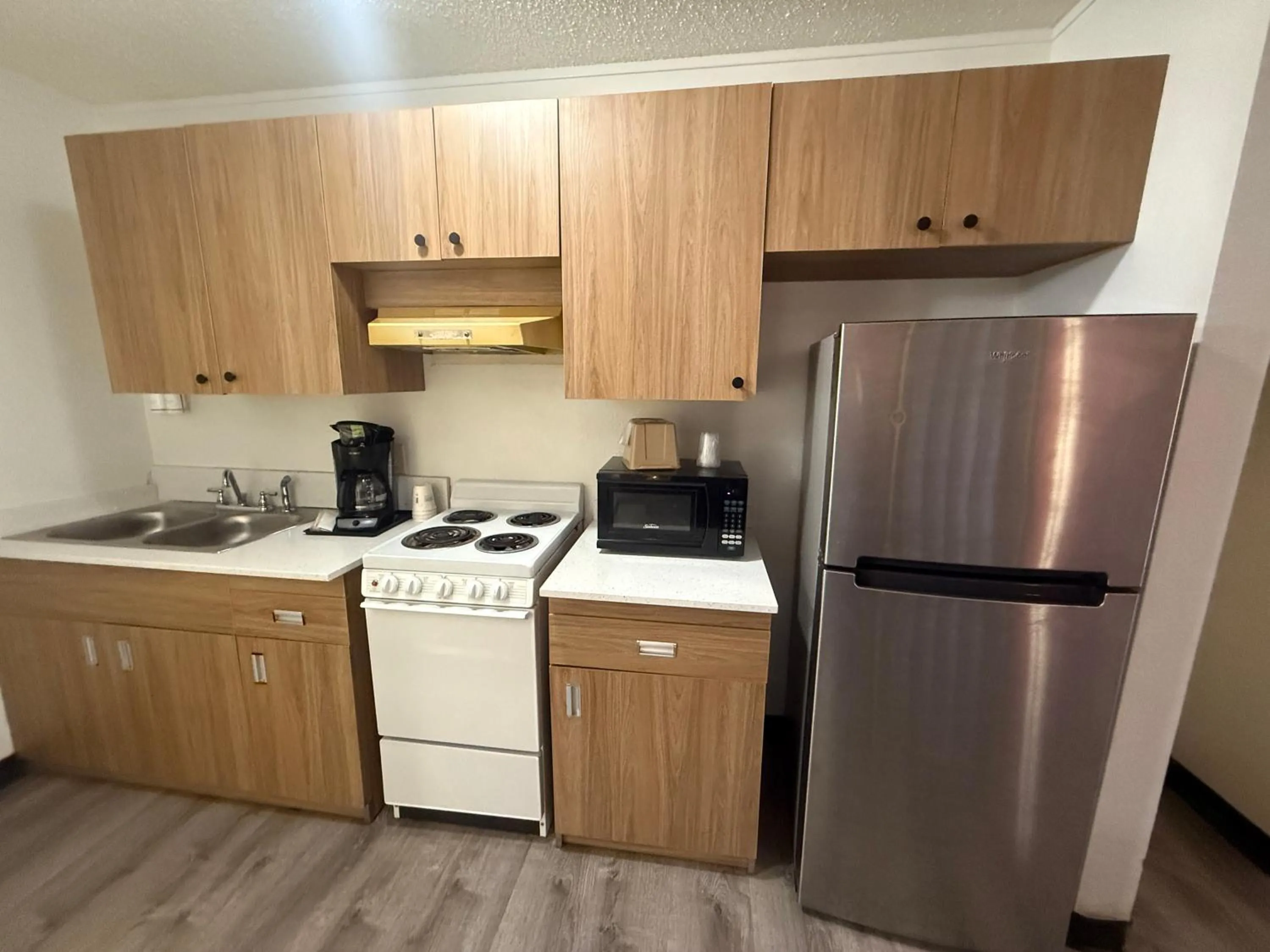 Kitchen or kitchenette in Super 8 by Wyndham Newcastle
