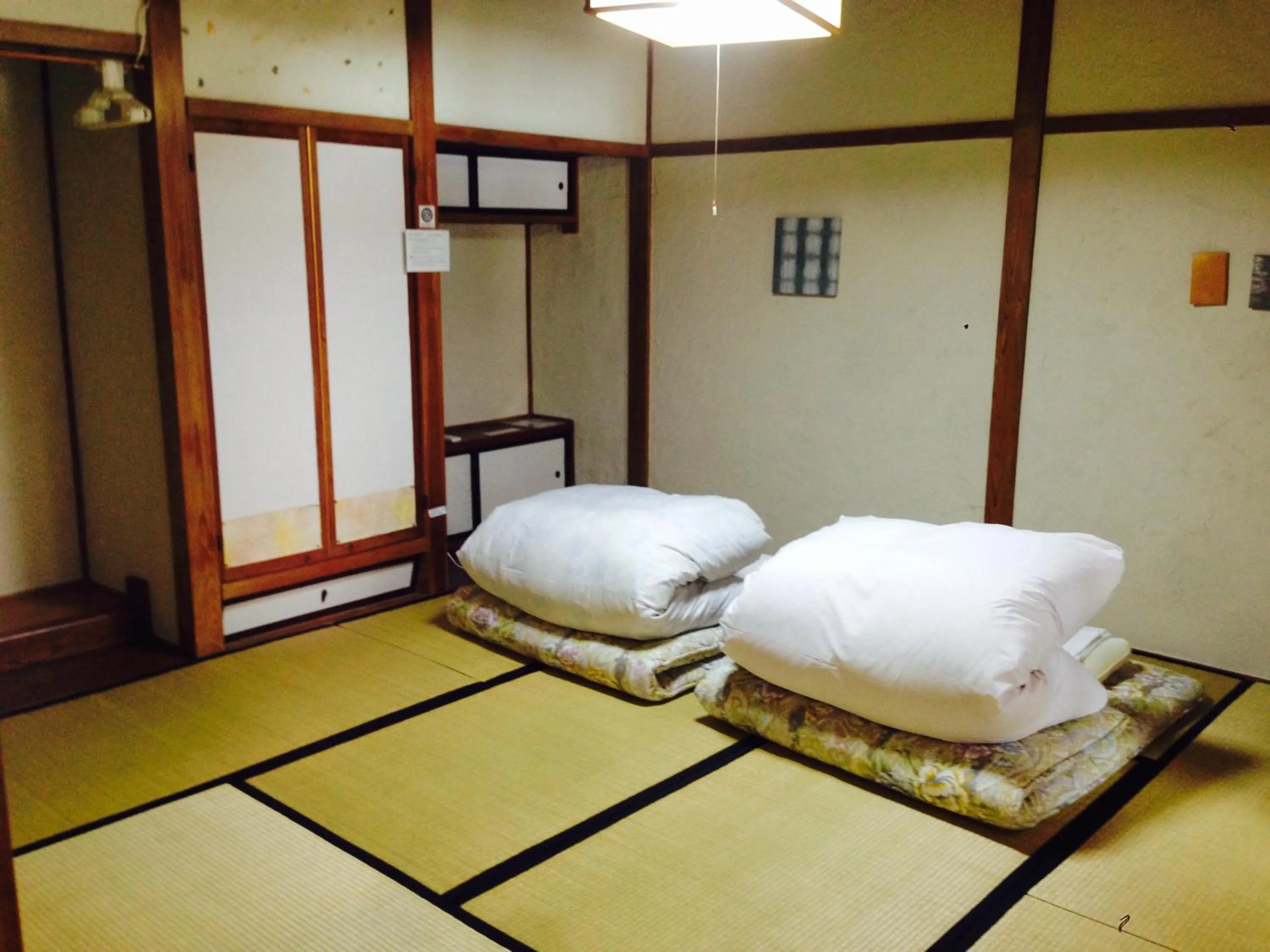 Bedroom, Bed in Guest House YAMASHITA-YA