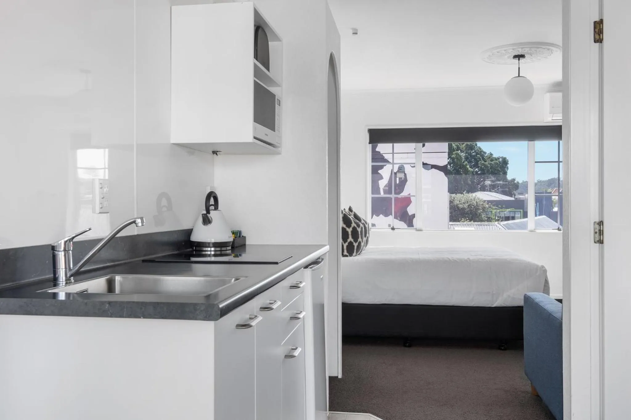 Bed in The Mission Belle Motel