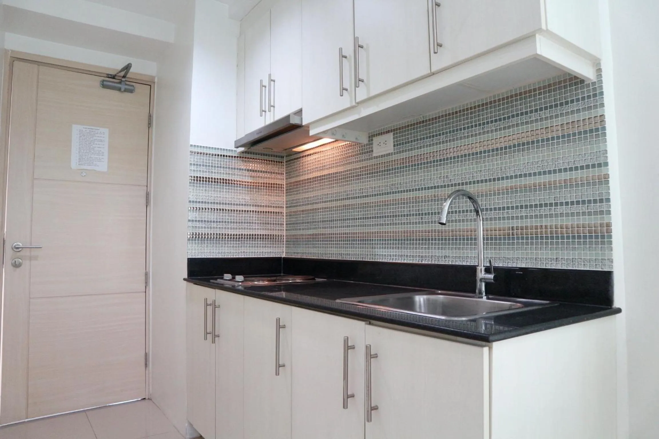 Kitchen or kitchenette in CondoDeal at Sea Residences