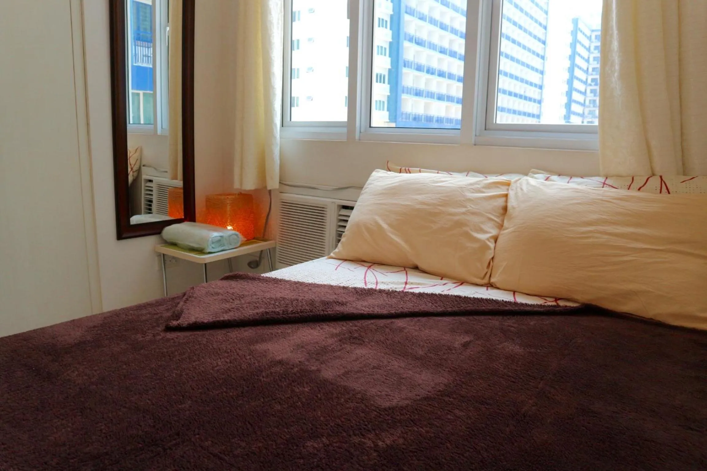 Bed in CondoDeal at Sea Residences