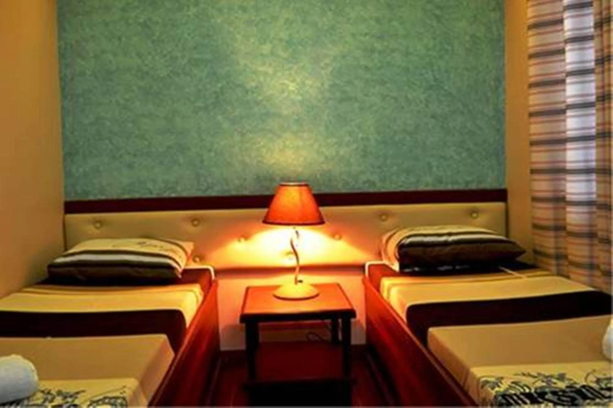 Bed in Julieta's Pension House