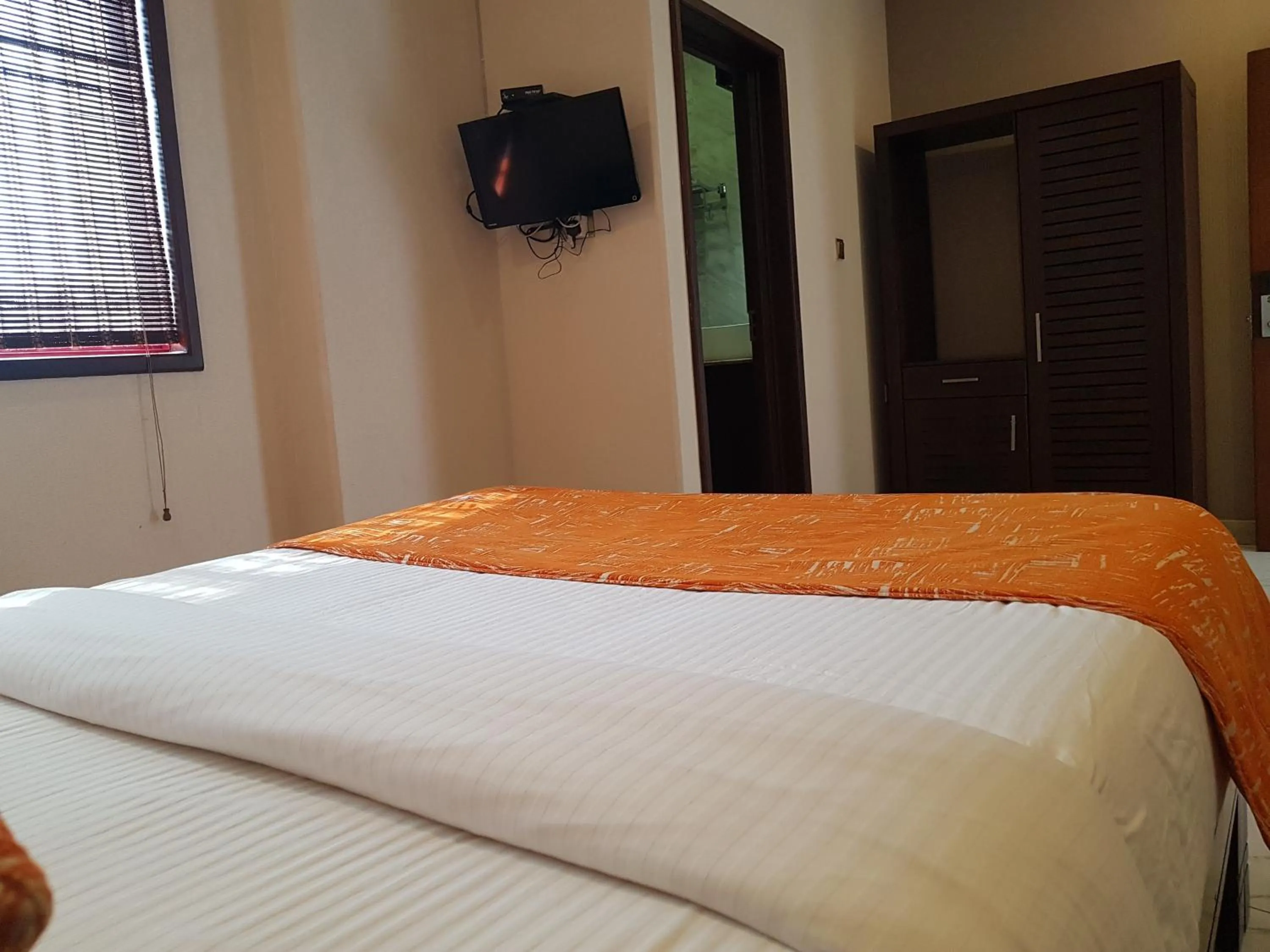 Bed in Galaxy City Hotel