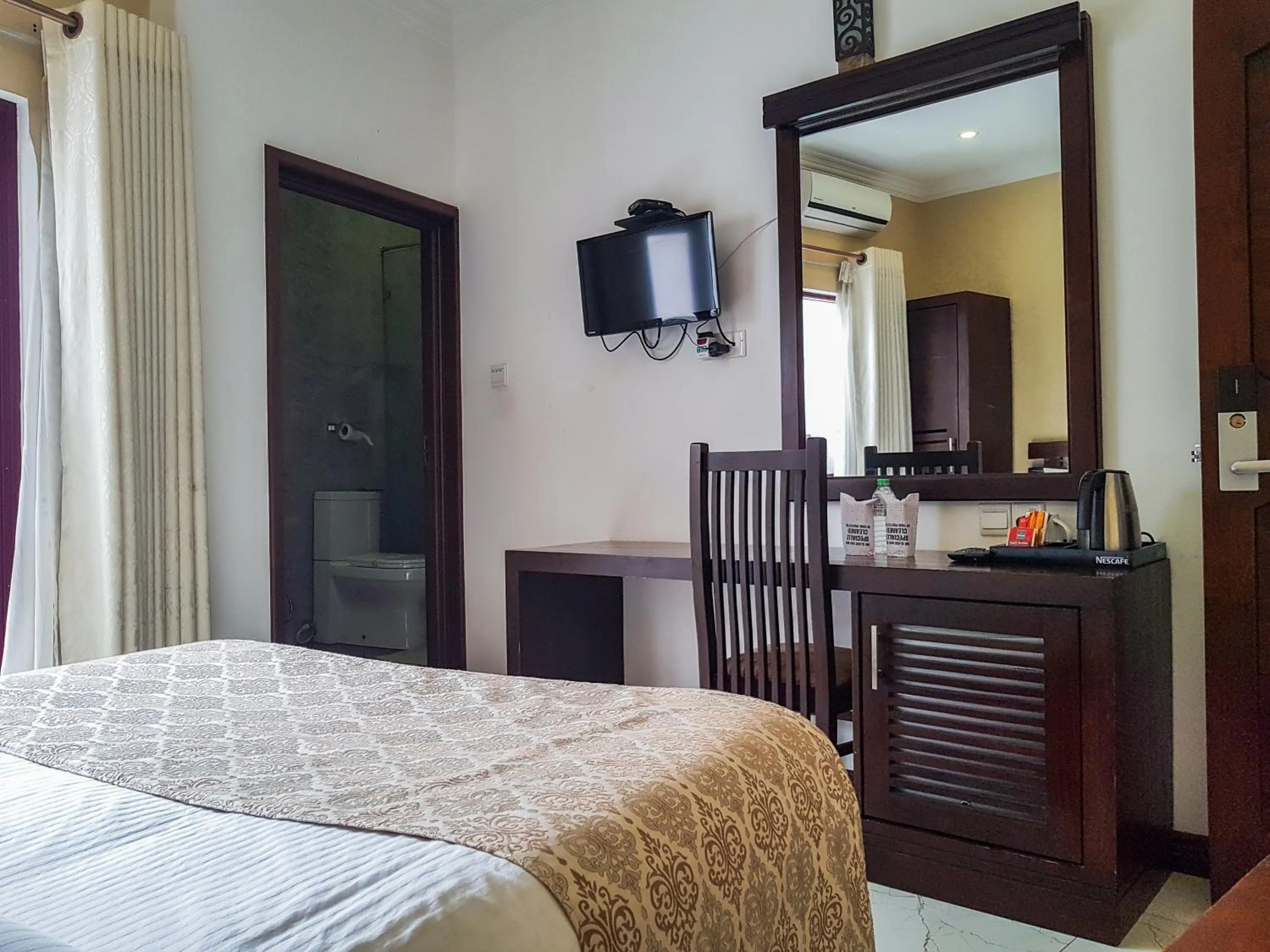 Bed in Galaxy City Hotel