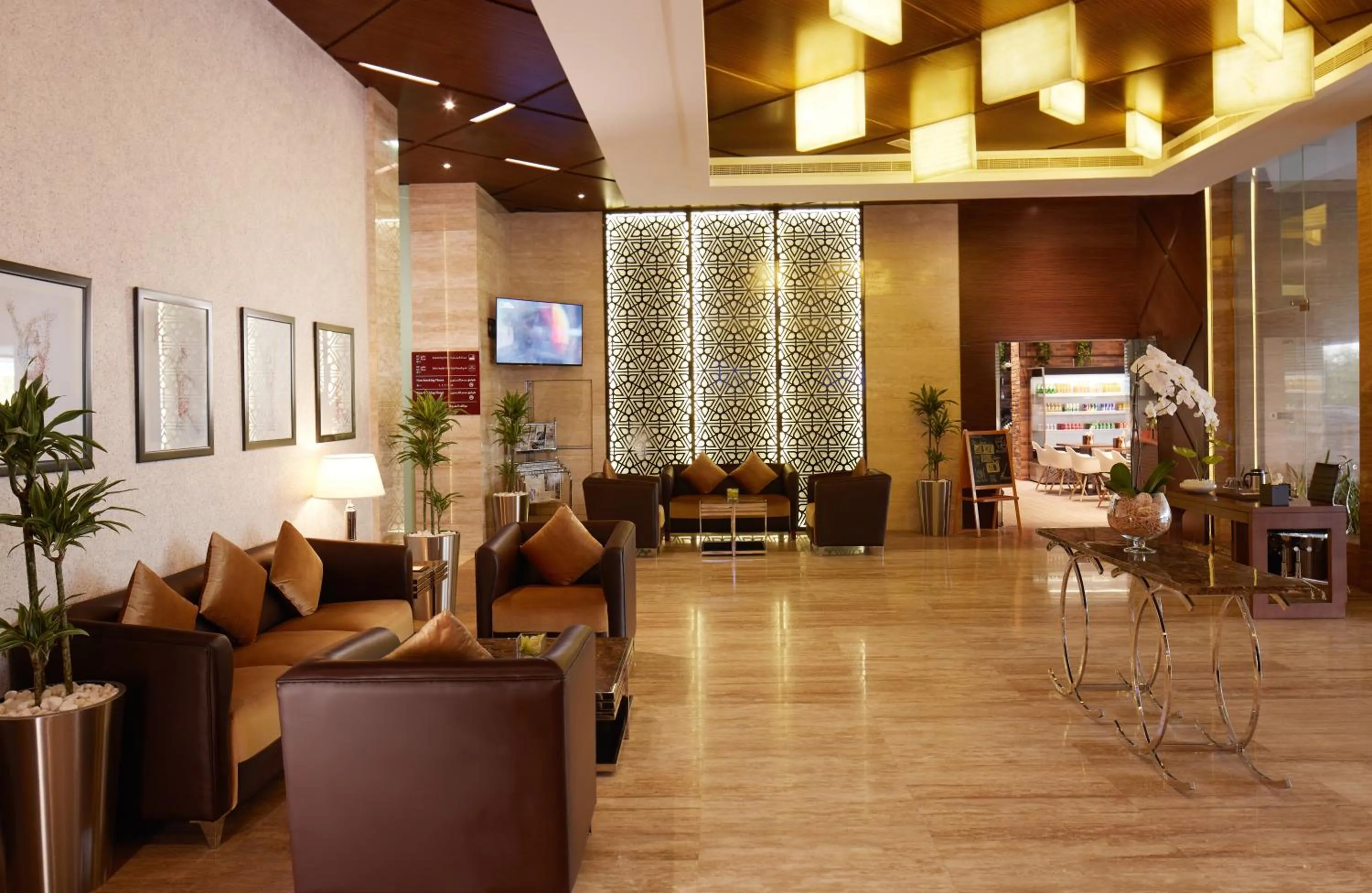 Lobby or reception in Treppan Hotel & Suites By Fakhruddin