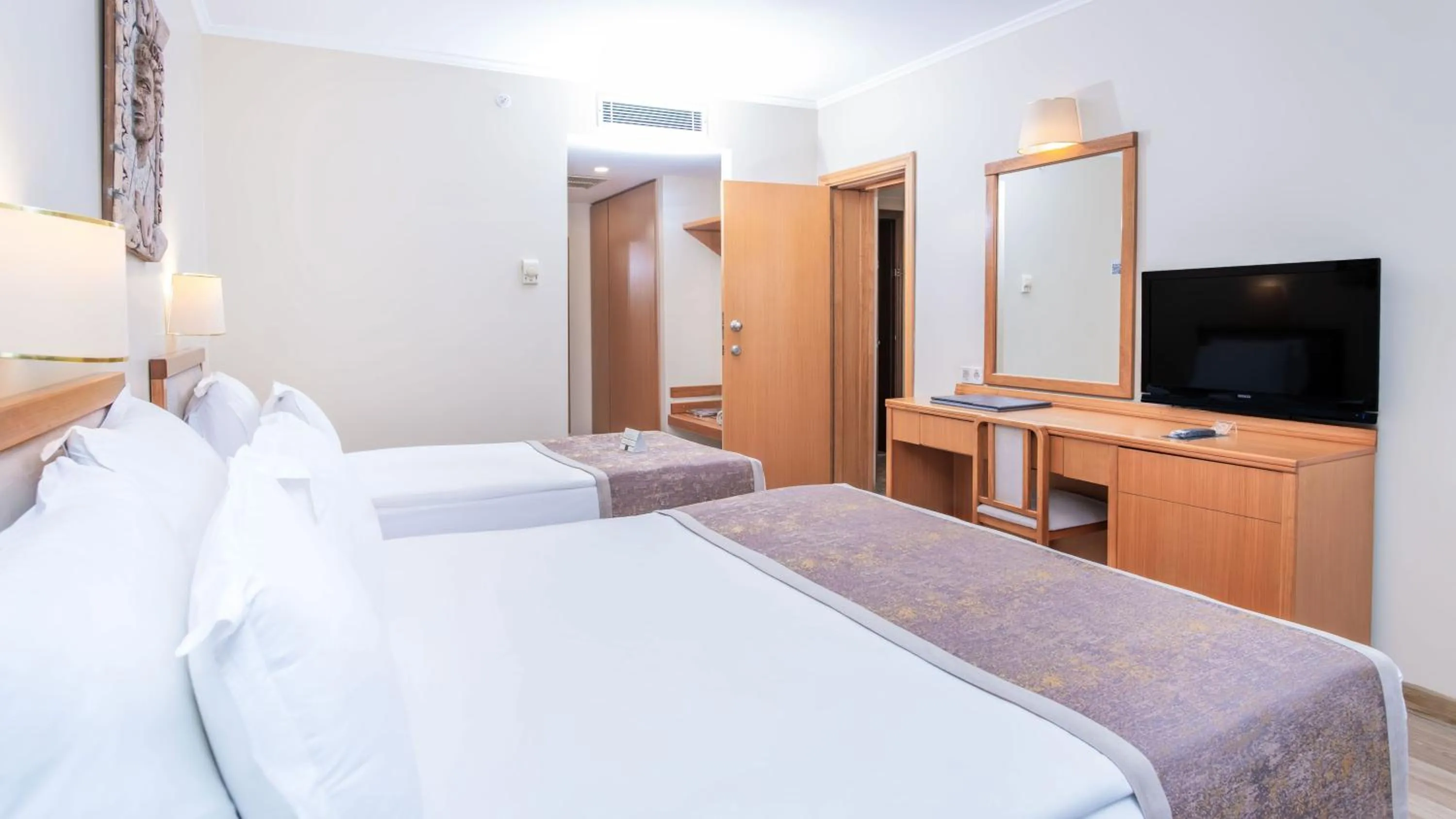 Bed in Miramare Queen Hotel - Ultra All Inclusive