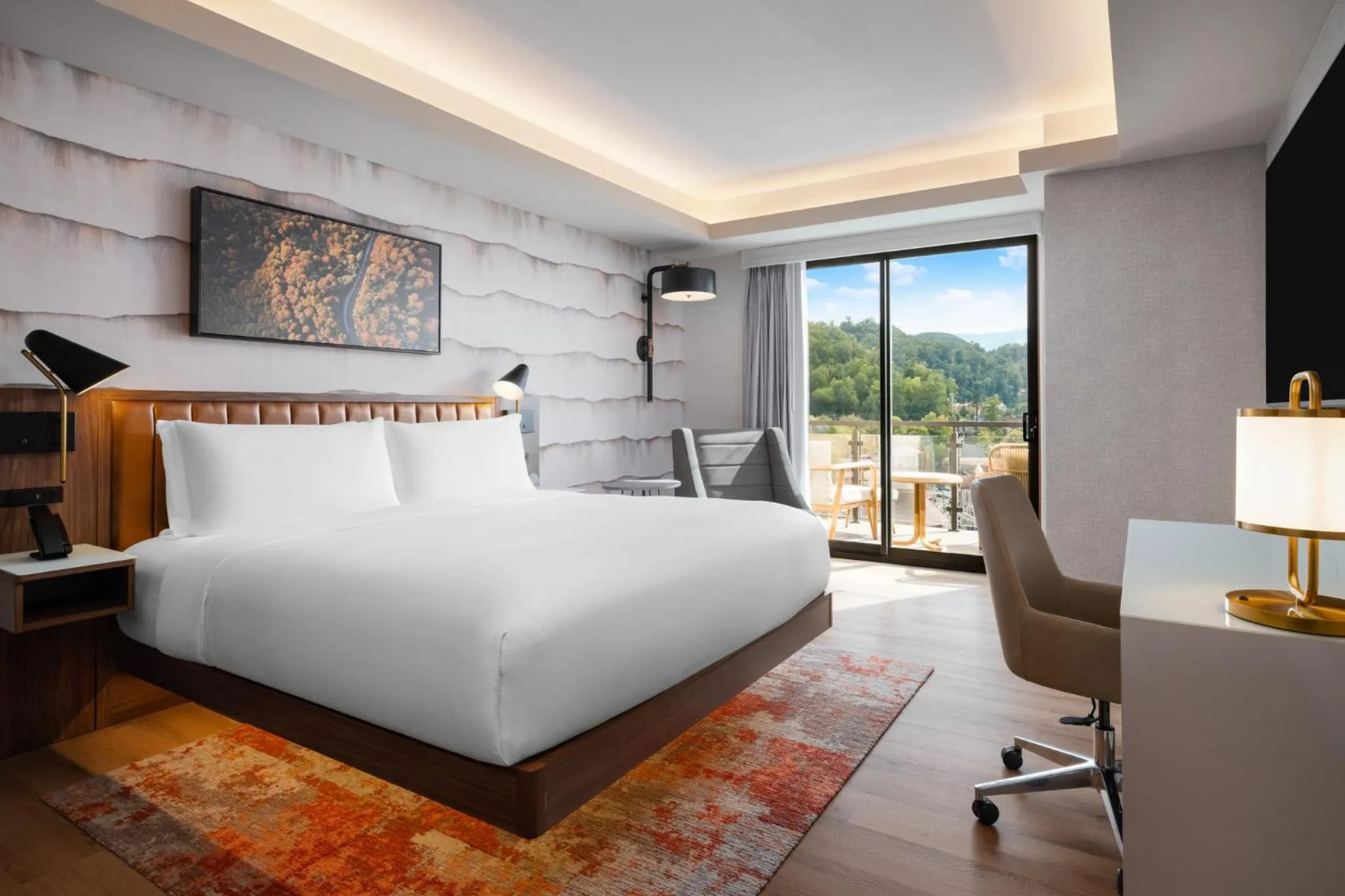 Photo of the whole room, Bed in Hotel Indigo Gatlinburg Downtown by IHG