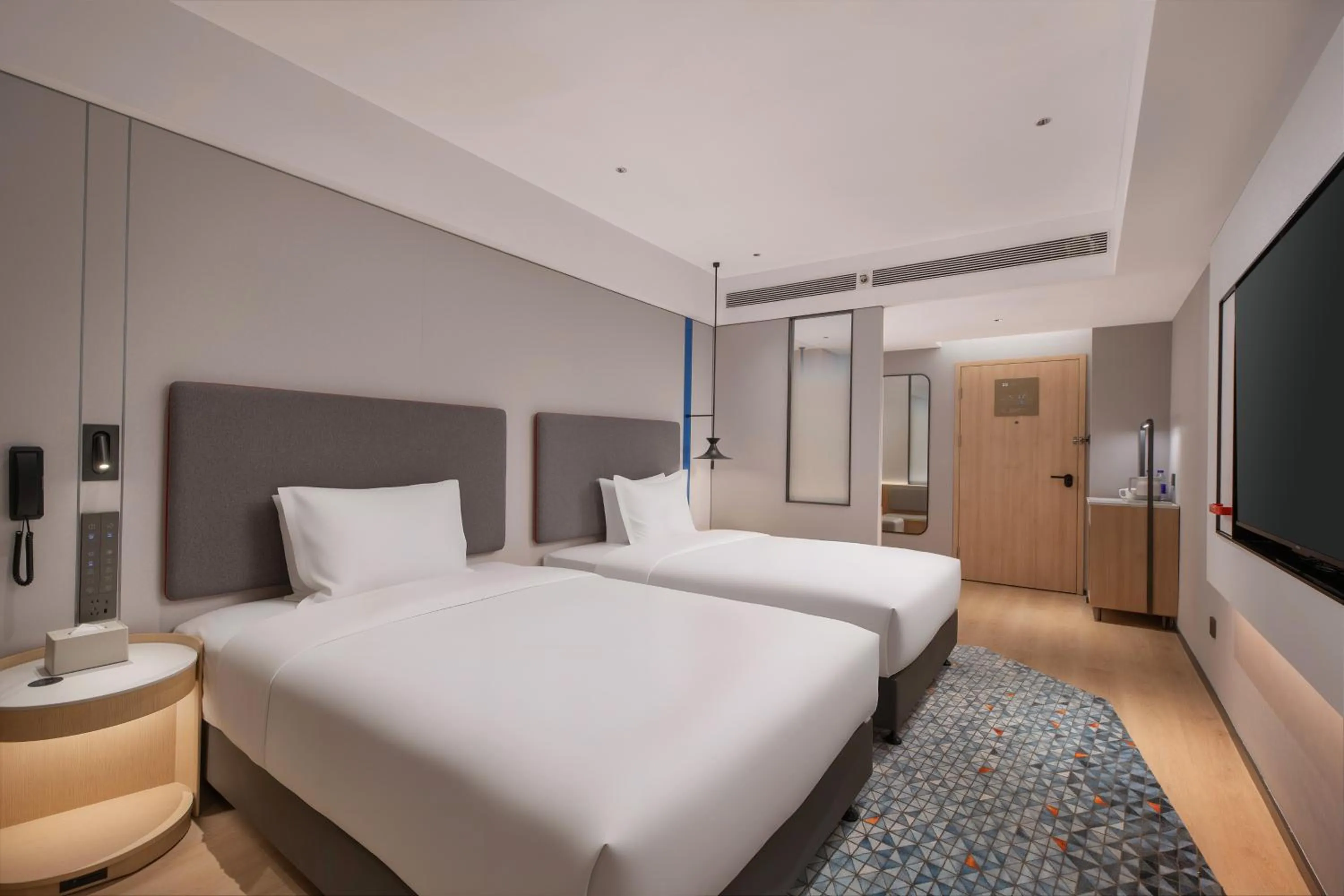 Standard Double Room with Two Double Beds in Holiday Inn Express Rizhao Oriental Colorful City