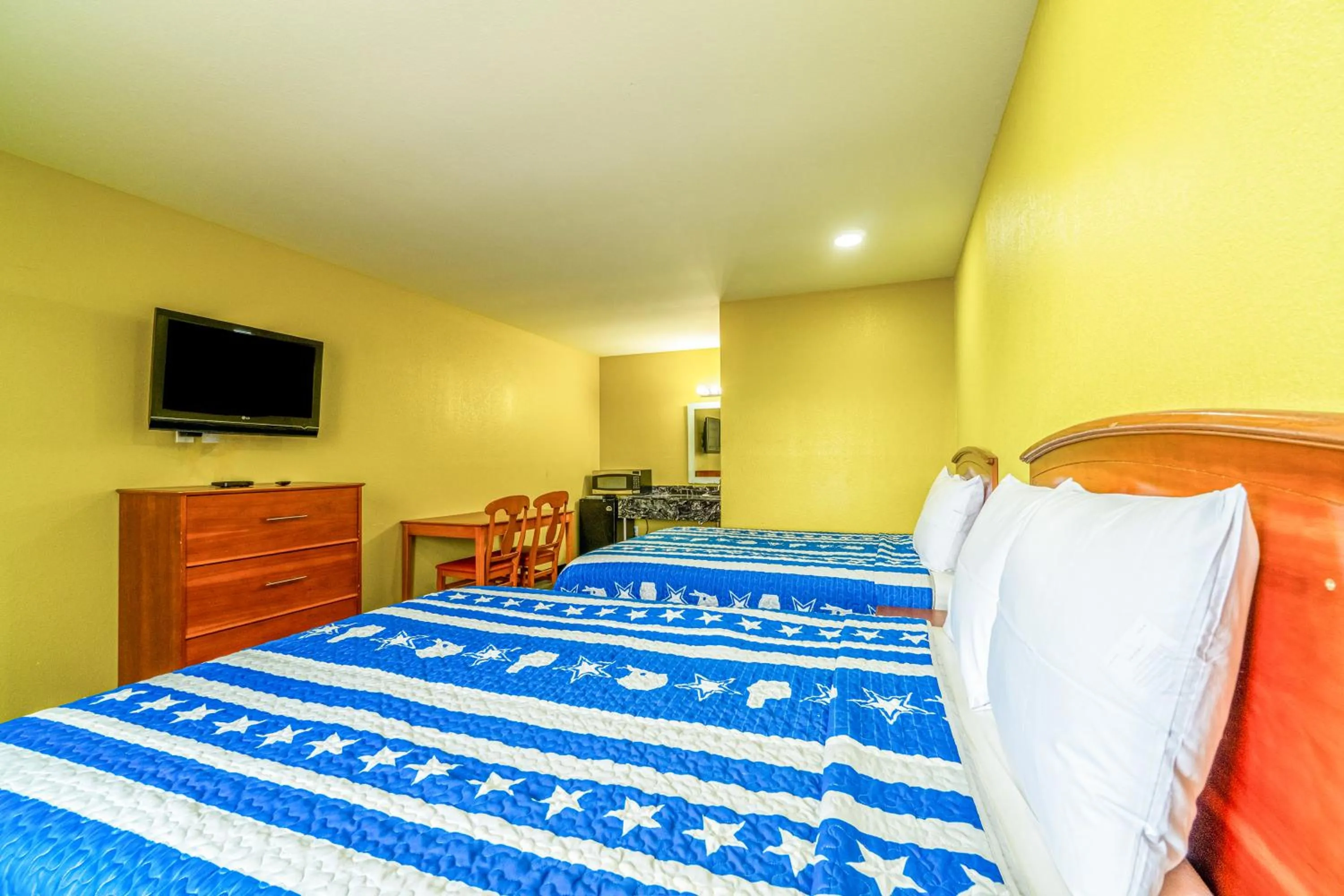 Bedroom, Bed in Regency Inn By OYO Rockdale TX