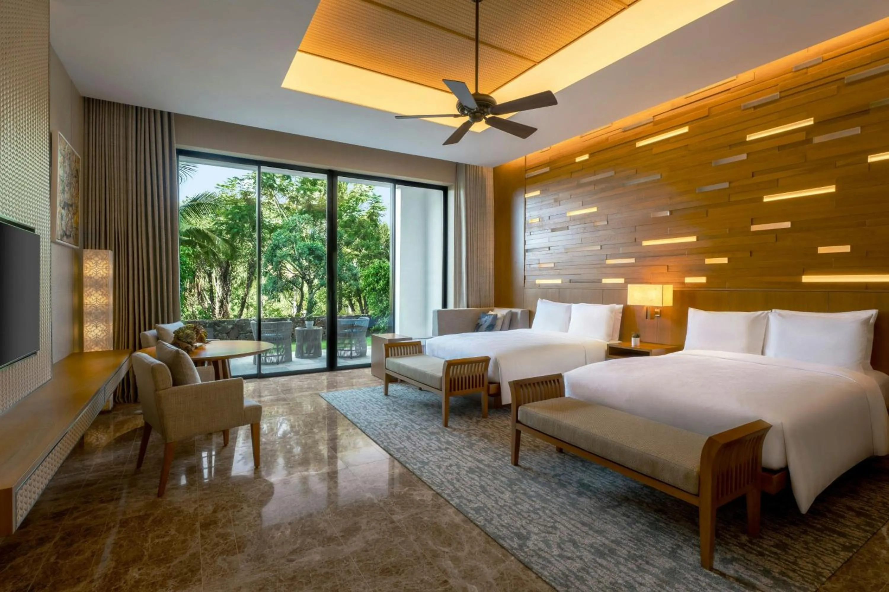 Photo of the whole room, Bed in JW Marriott Cam Ranh Bay Resort & Spa