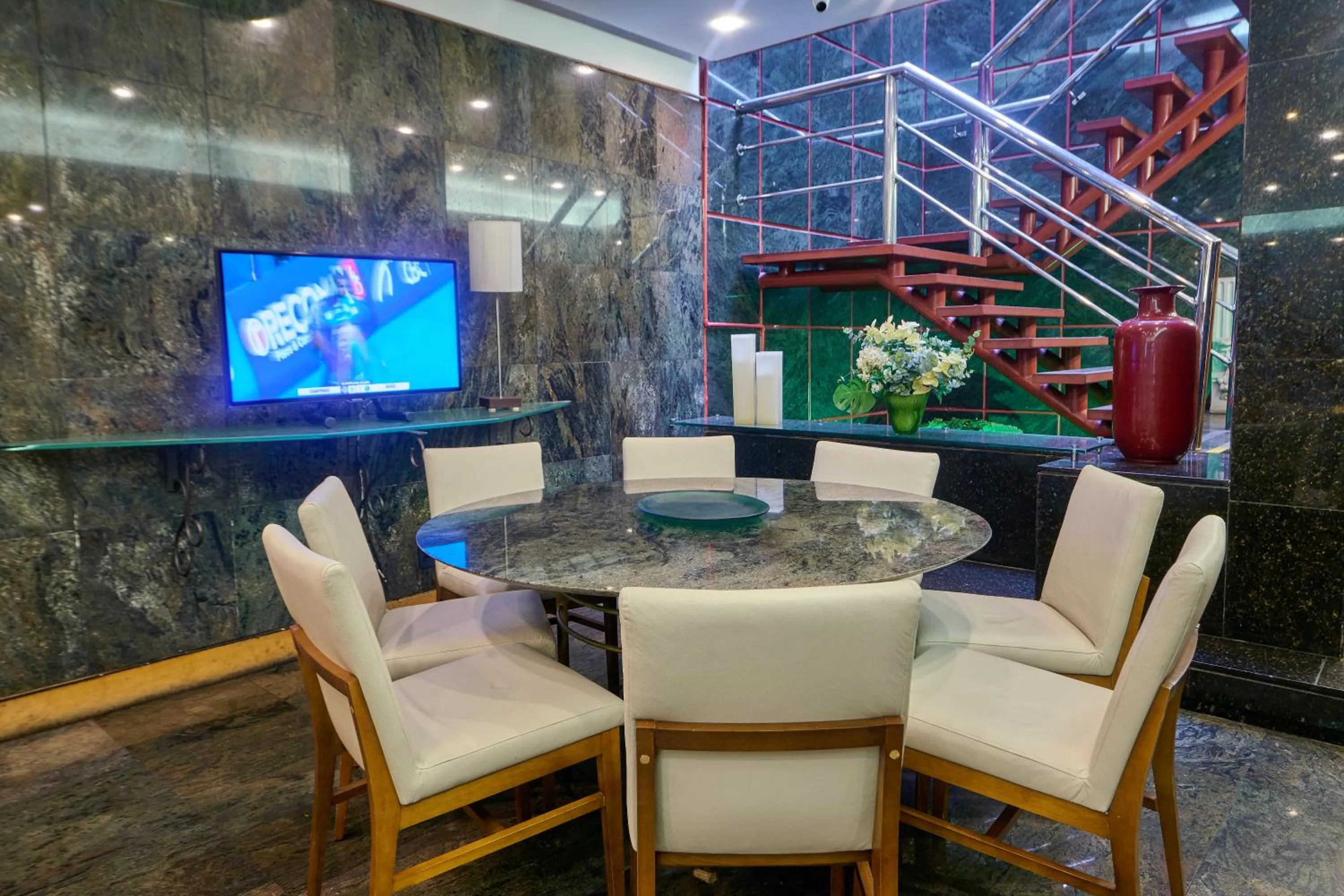 Communal lounge/ TV room in South American Copacabana Hotel