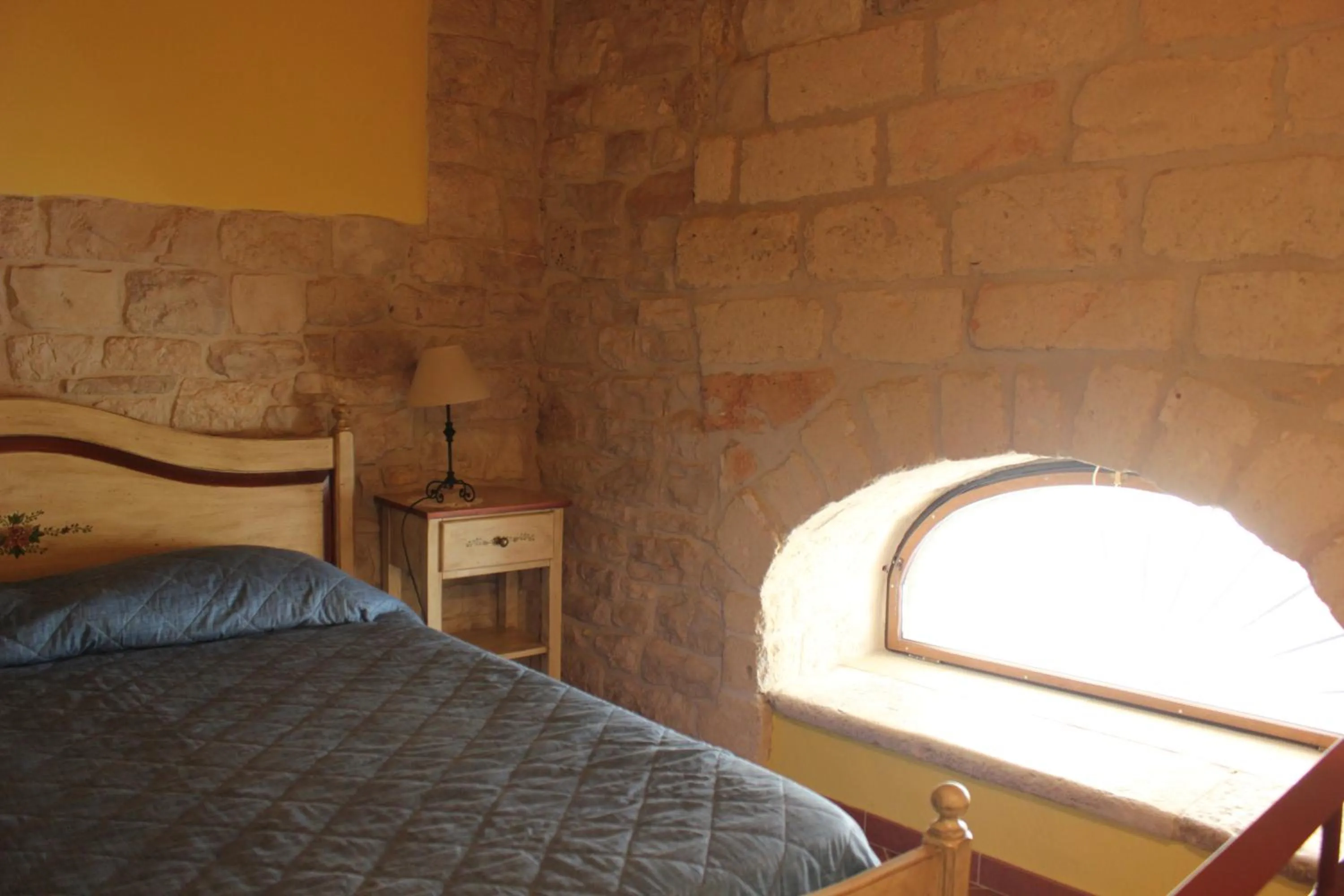 Decorative detail, Bed in Case Vacanza ARCO SANT'ANTONIO