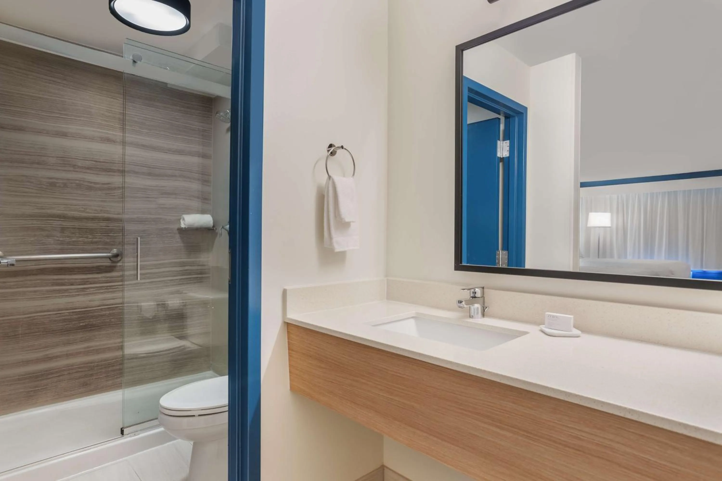 Bathroom in Spark by Hilton Hilton Head Island