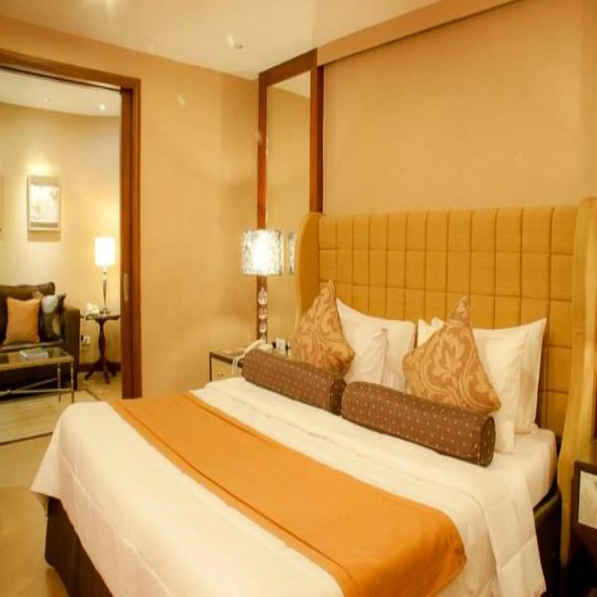 Bed in Royal Garden Hotel