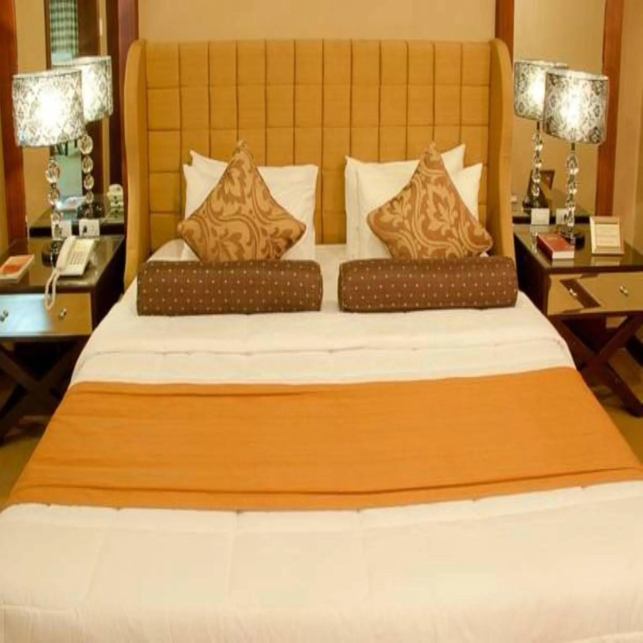 Bed in Royal Garden Hotel