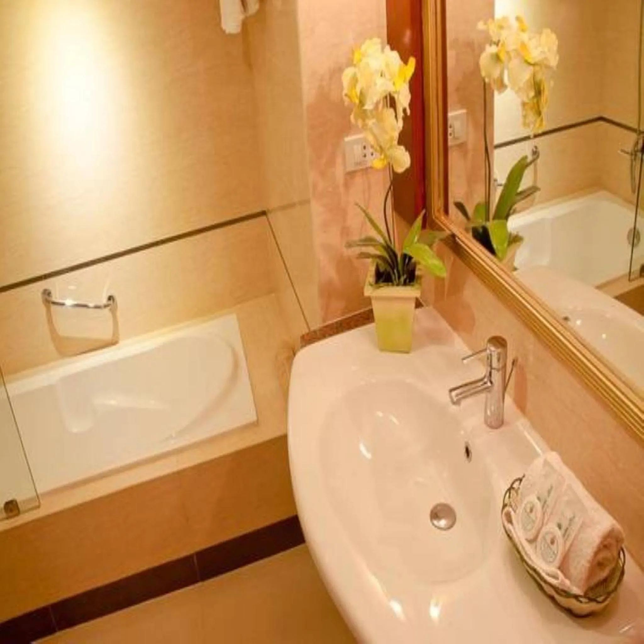 Bathroom in Royal Garden Hotel