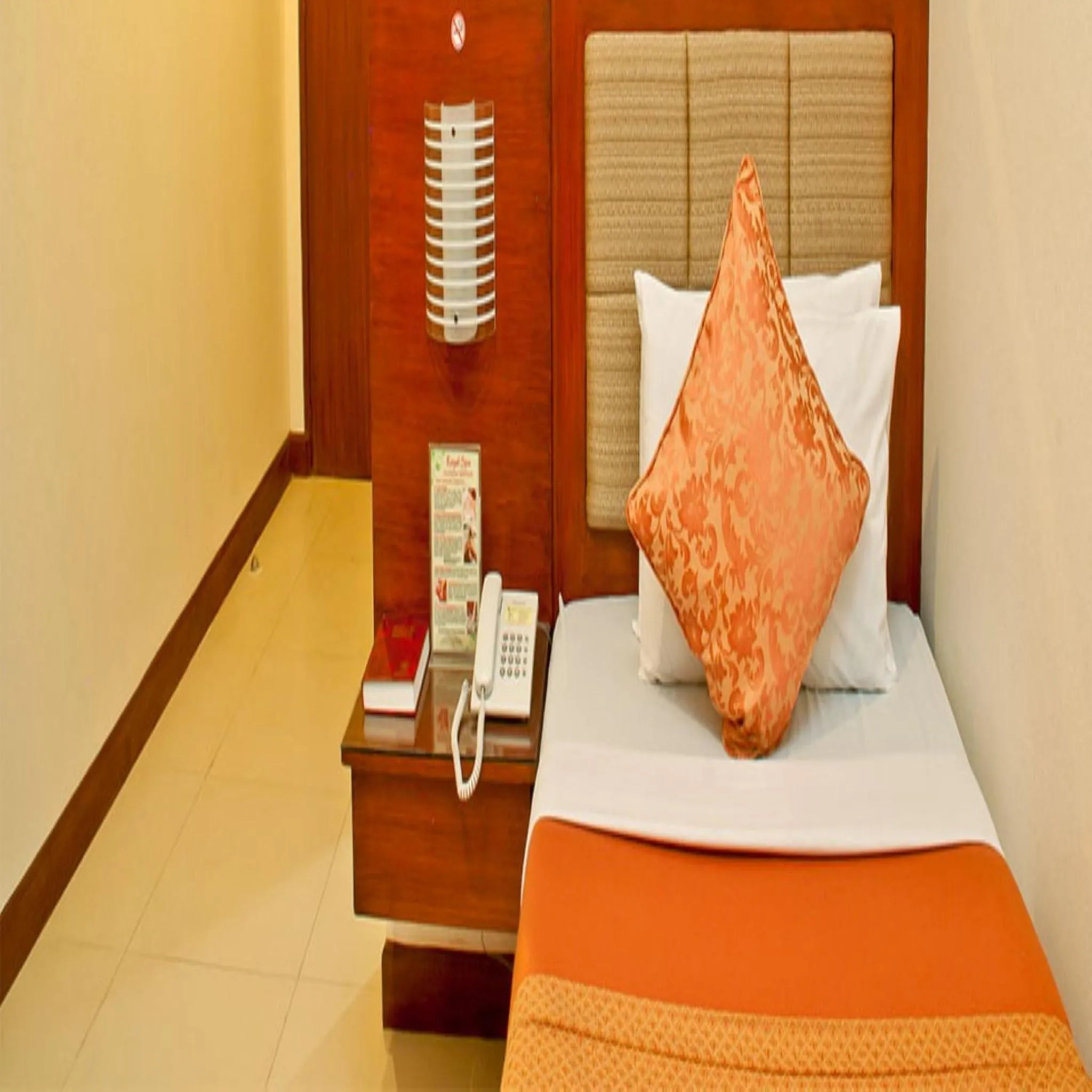 Bed in Royal Garden Hotel