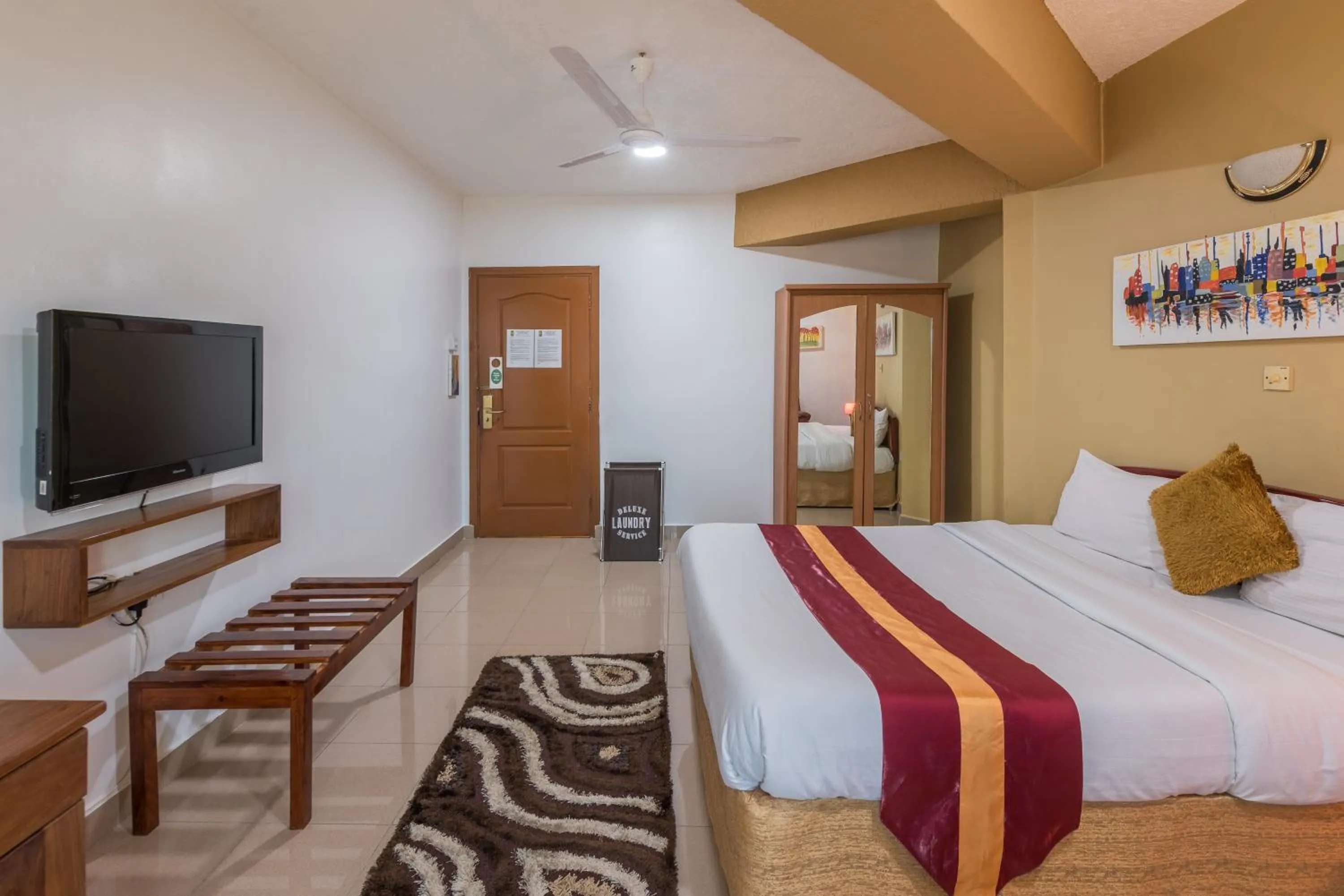 Bed in Hotel Raha Tower