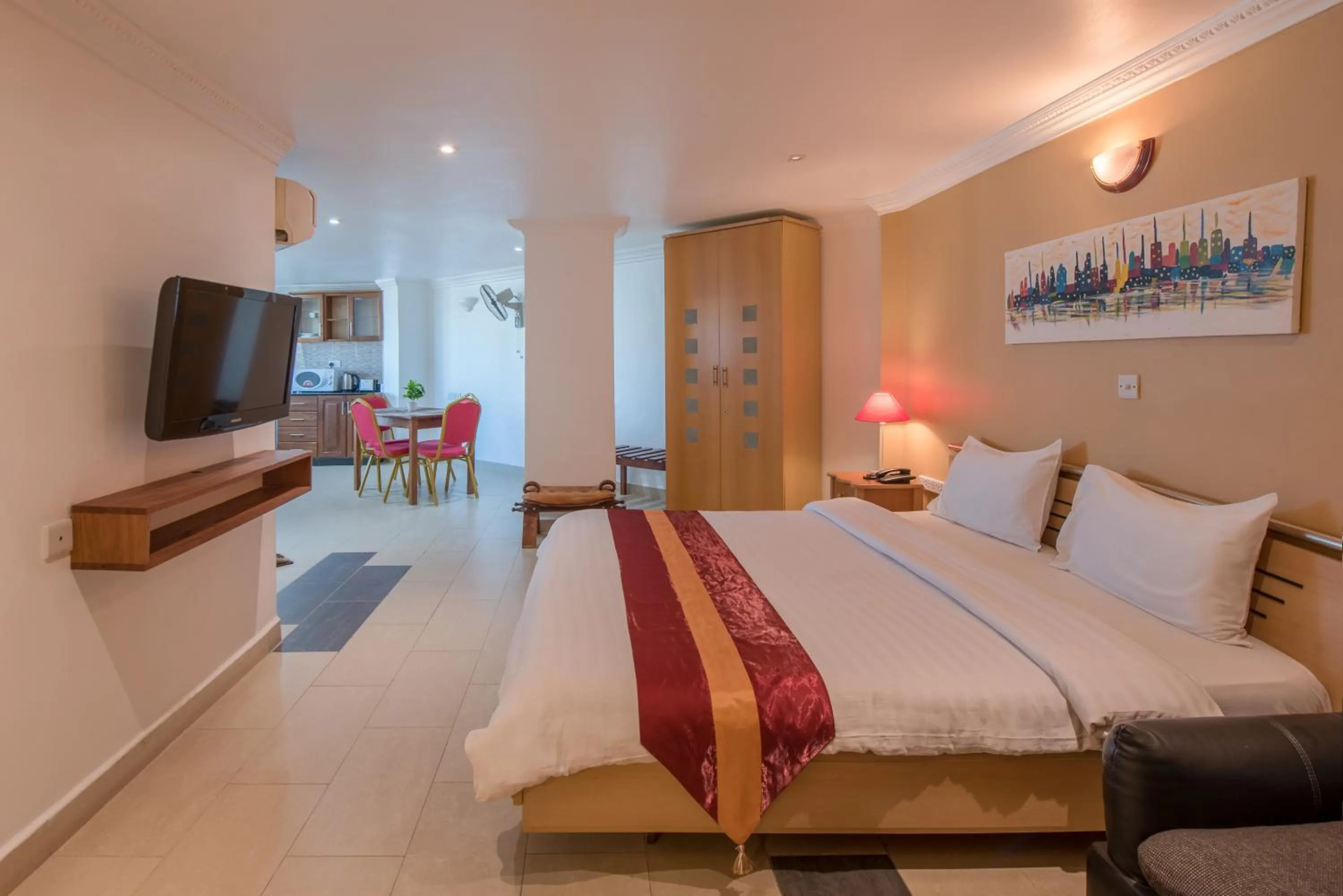 Bed in Hotel Raha Tower