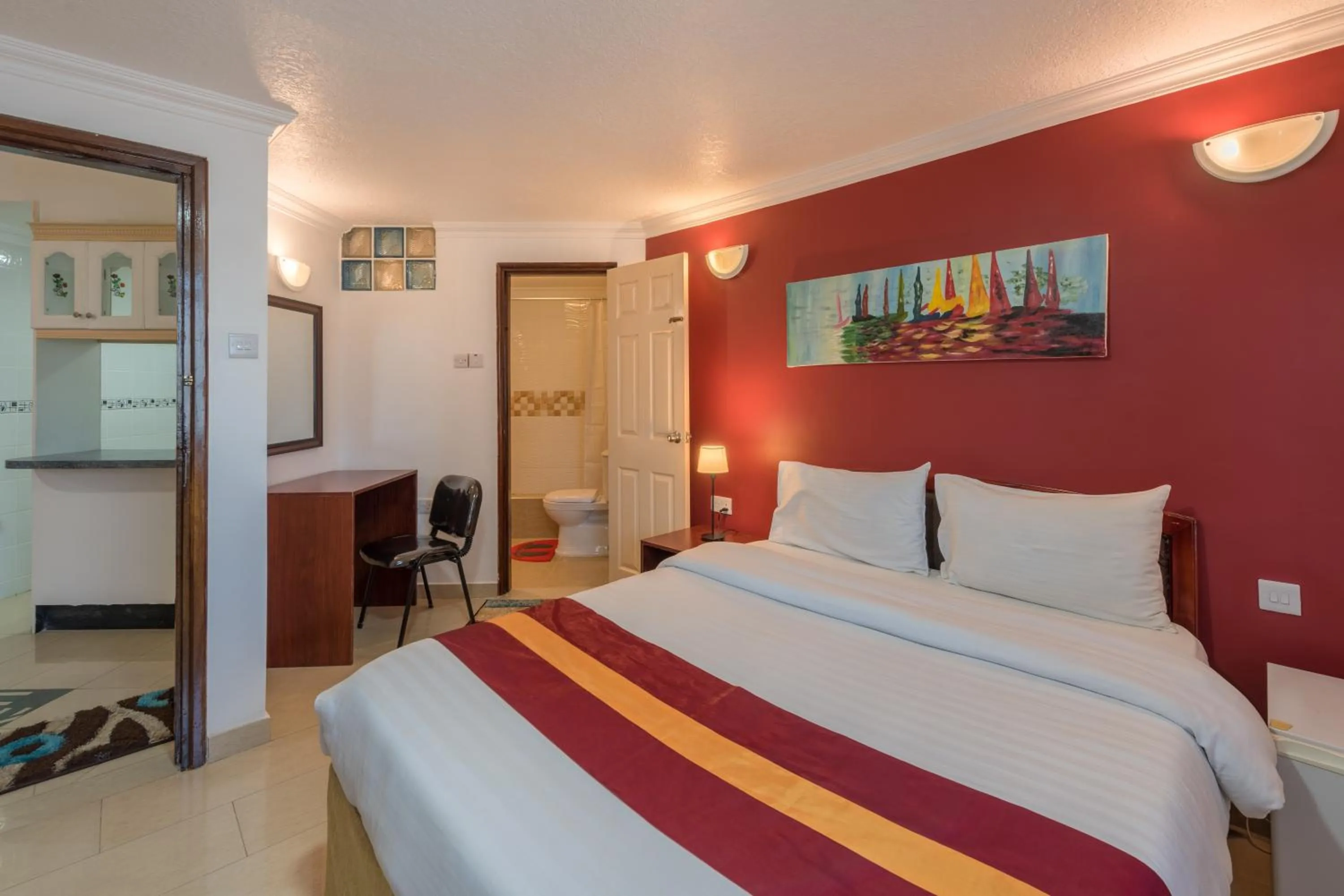 Bed in Hotel Raha Tower