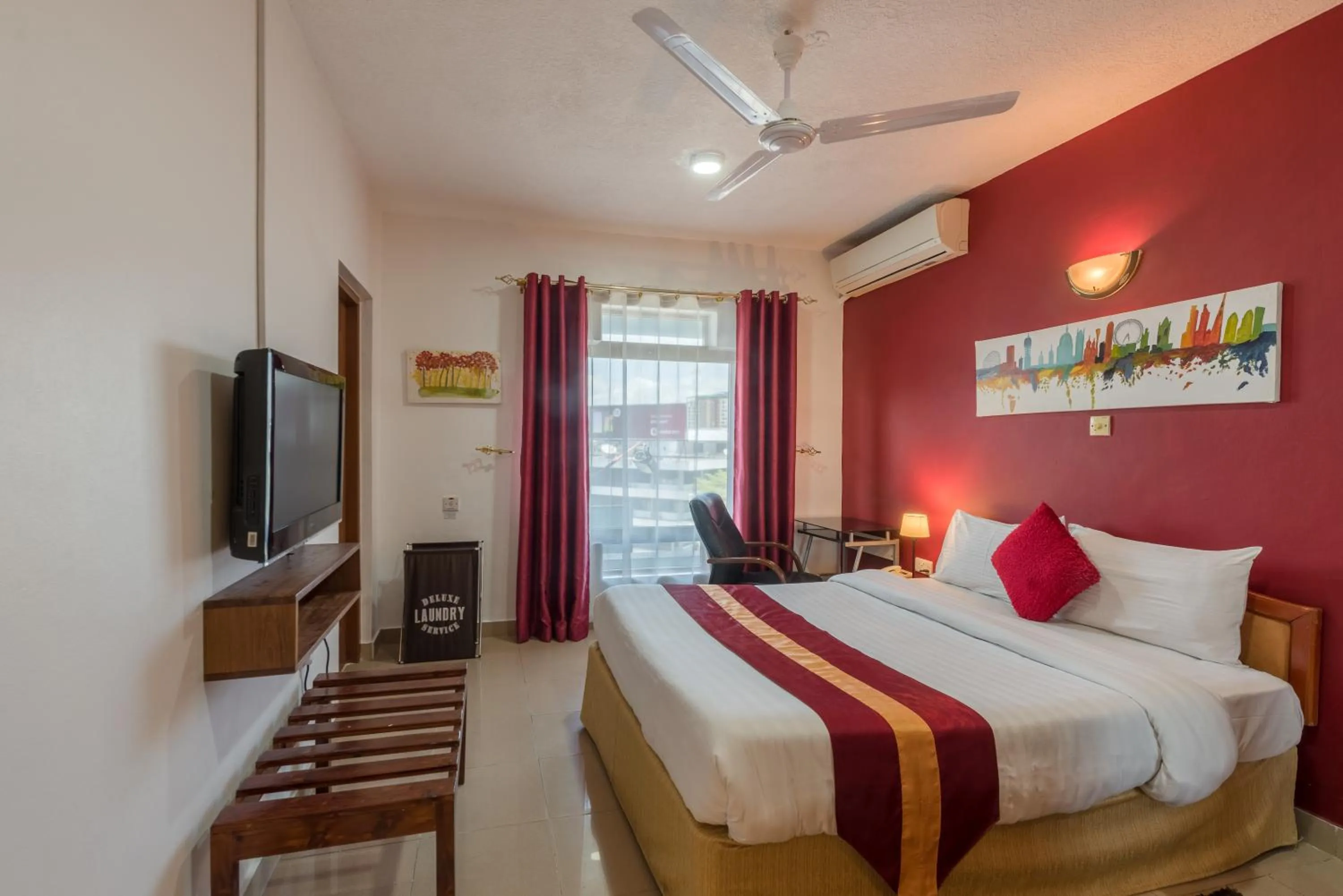 Bed in Hotel Raha Tower