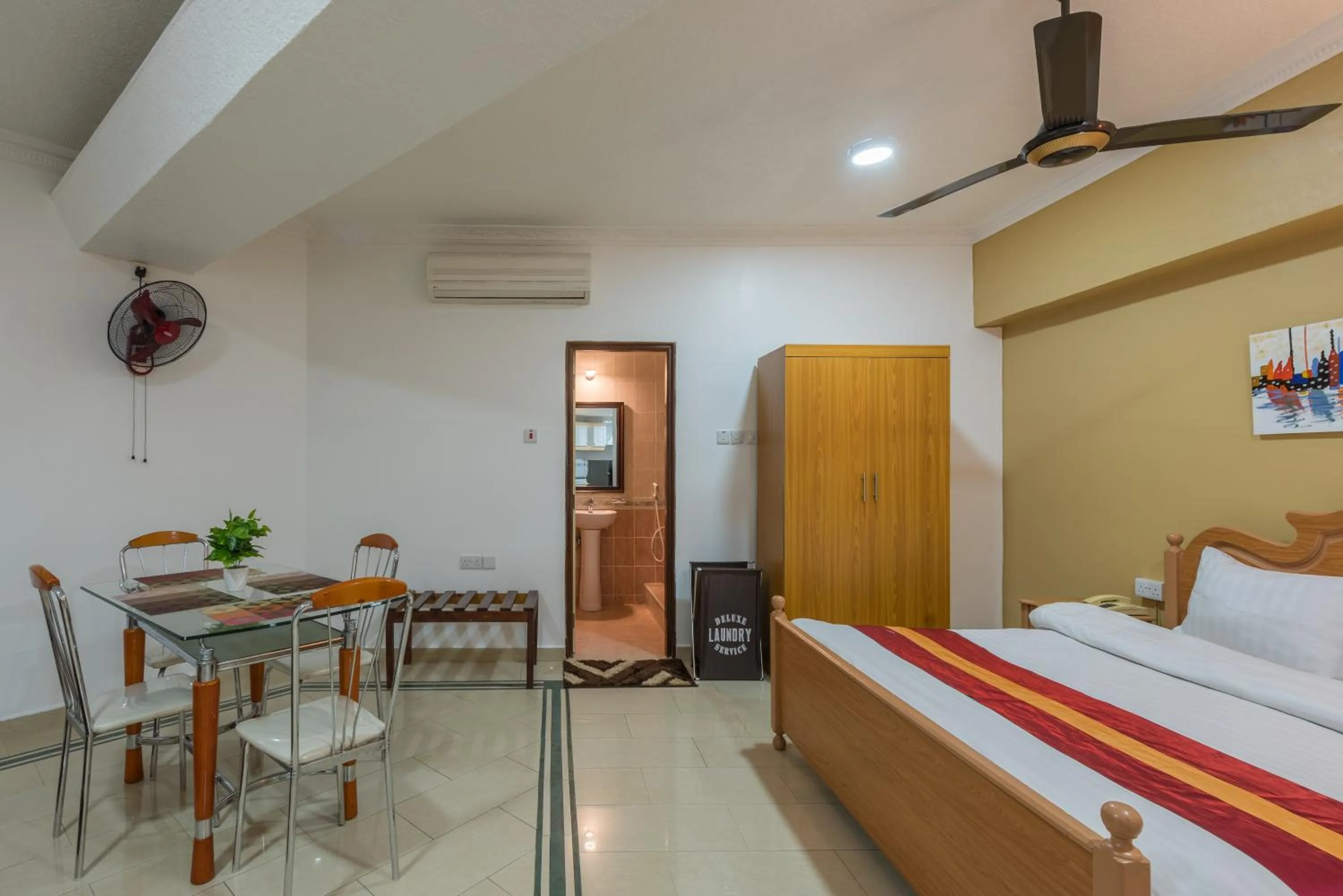 Bed in Hotel Raha Tower