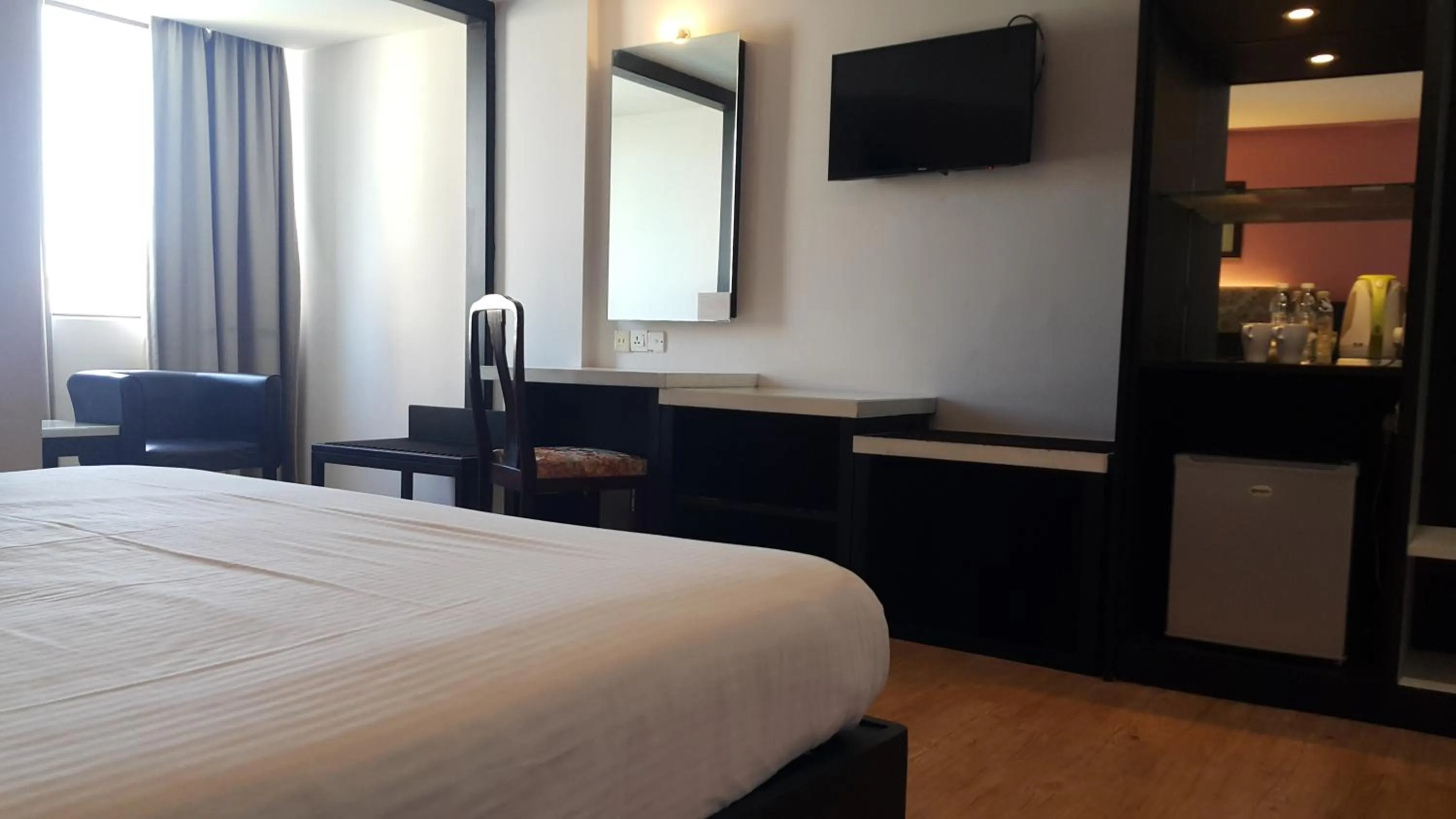 Bed in Red Rock Hotel Penang